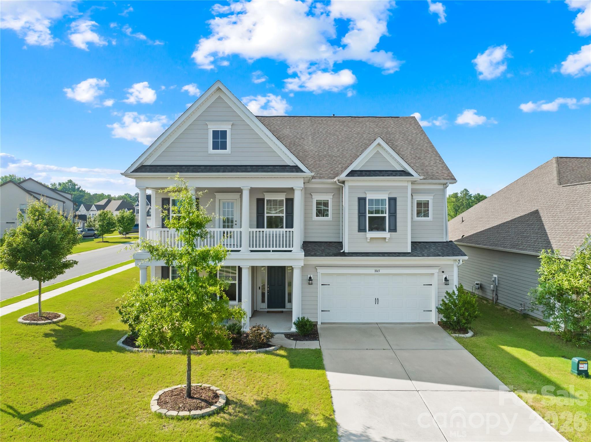 Better Than New Luxury in Overlook at Barber Rock. Built in 2021 and maintained to absolute model-home perfection, this stunning 5-bedroom, 3-bath residence delivers the ultimate blend of modern elegance and functional design. The heart of the home features a show-stopping gourmet kitchen with a massive center island, a butler’s pantry, and top-tier stainless gas appliances, flowing seamlessly into a sun-drenched breakfast area and a spacious family room anchored by a cozy gas fireplace. Designed for flexible living, the main level hosts a sought-after private guest suite that doubles as the perfect, quiet work-from-home office. Upstairs serves as a true retreat, boasting a versatile bonus room (functioning as the 5th bedroom) and a luxurious Owner’s Suite complete with elegant tray ceilings and a spa-like bath. You can even step outside directly from a secondary bedroom onto a private balcony to relax and enjoy the view. With premium upgrades throughout, a charming covered front porch, and a highly functional drop zone off the 2-car garage, every detail of this home has been curated for maximum style and comfort. A charming covered front porch offers the perfect spot for morning coffee, while the rear covered porch provides a seamless, all-weather outdoor extension of your living space—ideal for weekend barbecues, evening relaxation, or year-round entertaining.
The lifestyle here is just as incredible as the property itself. Spend your summers lounging at the community cabana and pool, or take advantage of being zoned for top-rated schools. Perfectly positioned just minutes from Ballantyne’s premier shopping and dining, the home offers unbeatable convenience. Commuters will love the easy access to Lancaster Highway, making trips to the Carolina Mall, downtown, or the local light rail effortless. Impeccably decorated, ultra-modern, and completely turnkey—your dream home is officially waiting!
