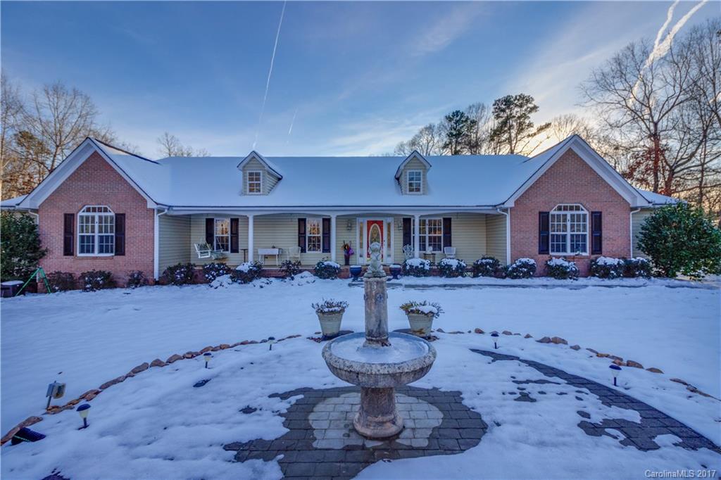 Sprawling ranch located on a 1.65 acre cul-de-sac lot in desirable Cameron Glen! Over 2600 sq. ft. featuring hardwood flooring, granite kitchen counters, stainless appliances, spacious master bath, huge outbuilding with electric, 2 fireplaces, screened porch, and a beautiful in ground salt water pool! The pool has a new liner, cover, and pump. New roof and 2 car att. side load garage. Commuter distance to Charlotte, Concord, Mooresville, and Winston Salem!