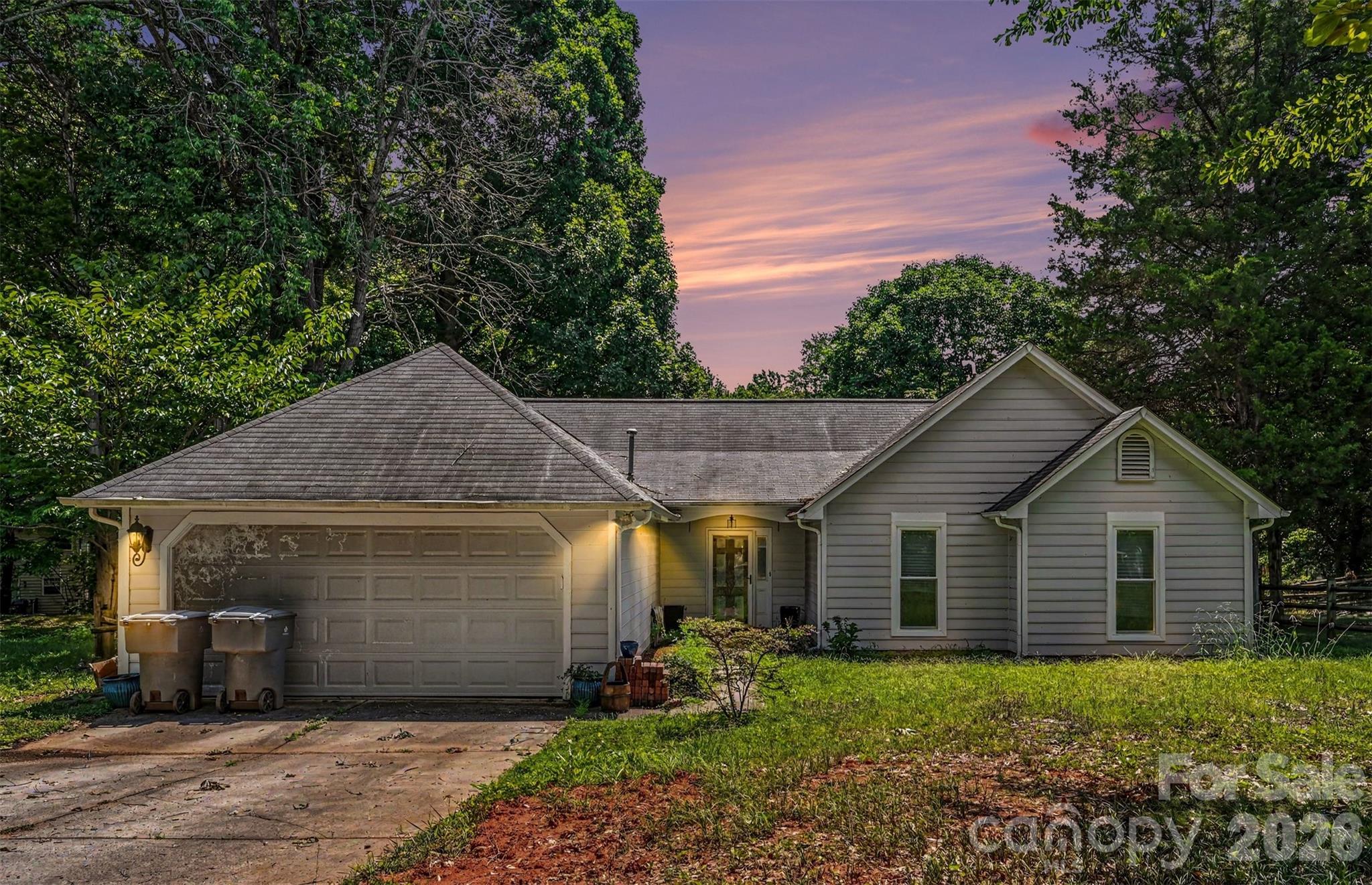 Welcome to 8410 Gidleigh Ct.! Nestled on a quiet cul-de-sac, this inviting home features an open and airy floor plan designed for comfortable living and effortless entertaining. The spacious great room showcases soaring vaulted ceilings, durable vinyl plank flooring, and a cozy brick wood-burning fireplace that serves as the centerpiece of the living space. Large sliding glass doors bring in abundant natural light and provide easy access to the backyard.
The kitchen offers ample cabinet storage, stainless steel appliances, generous counter space, and a bright layout that flows seamlessly into the breakfast area, making everyday meals and gatherings a breeze.
Retreat to the large primary suite featuring vaulted ceilings and plenty of room for a sitting area or additional furnishings. Spacious secondary bedrooms provide flexibility for guests or a home office. With its combination of open-concept living, updated flooring, cathedral ceilings, and desirable cul-de-sac location, 8410 Gidleigh Ct. offers a wonderful opportunity to enjoy comfortable living in a peaceful neighborhood setting. This location is convenient to everything! You are minutes from Latta Nature Preserve which houses Quest Nature Center and the Carolina Raptor Center, as well as walking trails, picnic shelters and Mt. Island Lake Access. You are also minutes from Northlake Mall and all the surrounding shopping, dinning, and entertainment the area has to offer. In 15 minutes, you could be in Uptown, UNCC or Lake Norman. It is this centralized location that makes this home such a great opportunity for a buyer or investor.