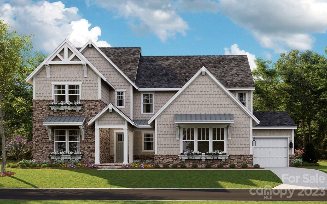 This stunning Napa floorplan is an entertainer’s dream! Light filled two-story foyer welcomes you to a grand open-concept floorplan with vaulted ceilings and amazing outdoor living! Stacking doors off of the Great Room and Dining Room allow indoor/outdoor living to flow seamlessly. Huge kitchen with a 10'6" island that seats 8 creates the ultimate gathering spot. This gracious first floor primary suite with spa inspired bath and freestanding tub overlooks a stunning private backyard. A Guest Suite on the main level with in-suite bath and walk-in shower will allow your guest to feel comfortable. Upstairs completes this amazing home offering 4 additional bedrooms and 3 additional full baths. Plus, a large bonus room space there is plenty of room for a media, office, or craft space. Located in Arden Mill, Fort Mill’s newest boutique community. Minutes from Kingsley and close to elem/middle/high school. Wooded lot with a 35' landscape buffer behind the property.