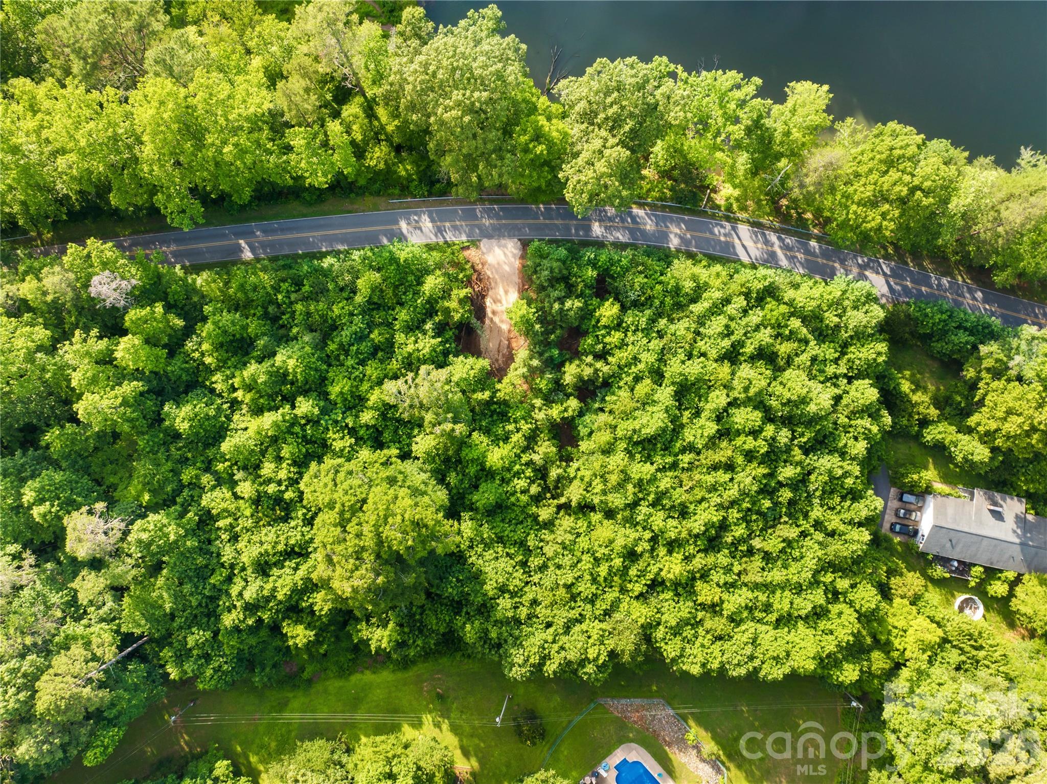 Escape the hustle and enjoy the charm of country living on this beautiful lot located on Old Wilkesboro Road in Statesville. This property offers a wonderful opportunity to build a custom home in a peaceful setting surrounded by the natural beauty of Iredell County. With plenty of space for a home, outdoor living areas, and recreational use, you'll have the freedom to design a property that fits your lifestyle.

Conveniently located just outside of town, you'll enjoy the serenity of a rural environment while remaining close to shopping, restaurants, schools, healthcare, and major transportation routes. Whether you're looking to build now or invest for the future, this lot offers an ideal combination of location, accessibility, and potential.

Don't miss your chance to own a piece of the countryside with all the conveniences of Statesville just minutes away.