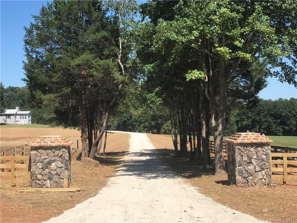 Hidden Treasure!!!! 66.97 acres with a 4 bedroom 2 bath home, basement with additional bath. Breath taking views. 2 ponds for the homeowner to sit in sunroom and enjoy the view. Rolling hills perfect for horses to roam. Huge stone columns to welcome you at entrance. Black four plank fencing being installed at front of property. Too many features to mention. Schedule your appointment before this property is gone.