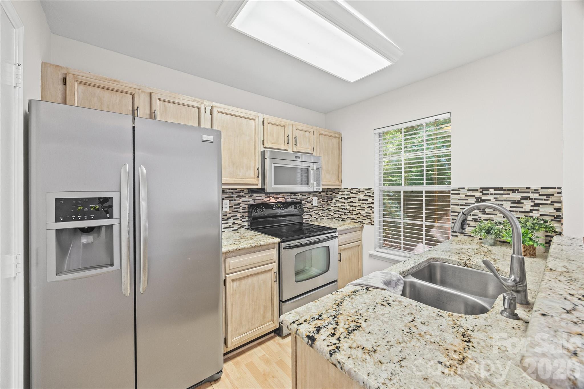 Welcome home to this beautifully updated 2-bedroom, 2.5-bath townhome ideally located in the heart of South Charlotte. Nestled within the established Crestview I community at the southern edge of the Raintree Country Club area, you'll enjoy convenient access to Ballantyne, The Bowl, Rea Farms, Waverly, I-485, shopping, dining, and everyday conveniences. Inside, you'll find two spacious upstairs primary suites, each with its own private updated bath, making this floor plan ideal for homeowners, guests, or roommates. The main level features durable laminate flooring, an updated kitchen with modern appliances, a convenient laundry room with washer and dryer included, fresh interior paint, and professionally cleaned carpeting. Step outside to the private rear deck overlooking a peaceful wooded setting—perfect for relaxing after a busy day. Residents enjoy a low-maintenance lifestyle with HOA dues covering lawn care, exterior maintenance, water, sewer, and common area upkeep. Located within the scenic Raintree golf course community, this property offers an exceptional opportunity for first-time homebuyers, those seeking a convenient lifestyle, or investors. The home has been a successful long-term rental, and there is currently no rental cap within the community. Don't miss this opportunity to own an affordable, move-in-ready home in one of South Charlotte's most convenient and desirable locations. Please contact Raintree Country Club for membership questions and availability.