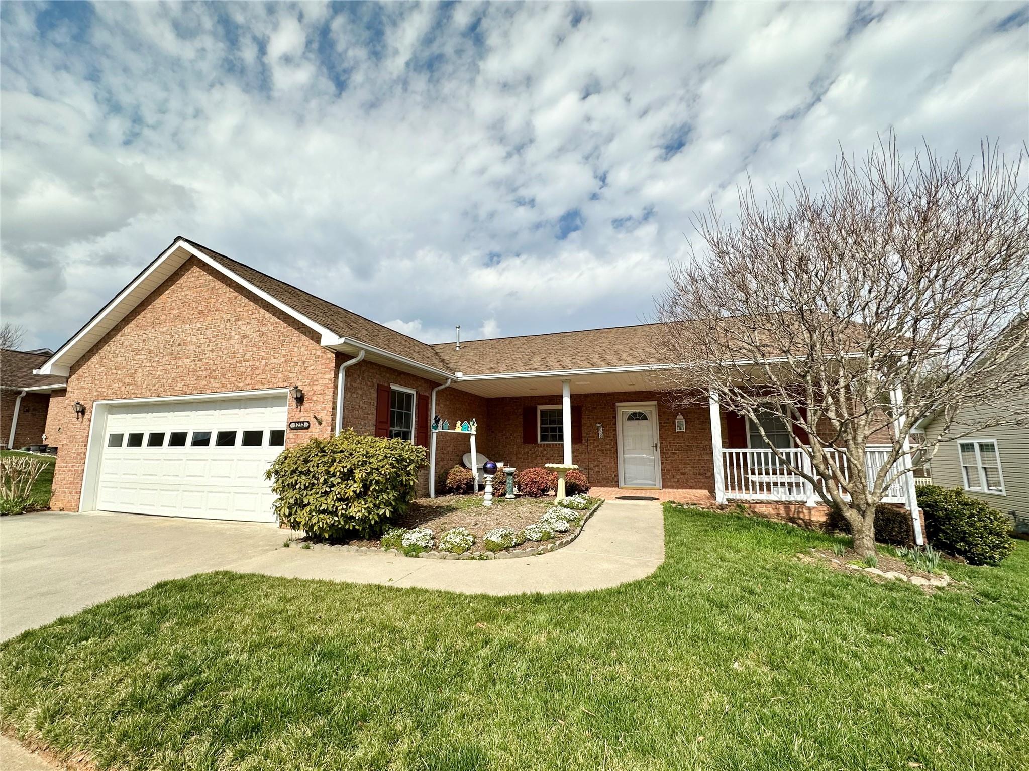 A new roof, gas furnace, and central air will be installed prior to closing!! Located in the Wexford Village Community, this lovely 2 bedroom, 2 bath home has so much to offer! You'll be greeted by an inviting large front porch w/ a brick paver floor. Walking through the foyer you'll enter the large great room featuring a corner gas log FP & hardwood flooring. The open floor plan is great for entertaining. The kitchen has a breakfast bar & lots of counter space & cabinetry. The bedrooms are on opposite sides of the home for privacy. There's a screened back porch to enjoy the outdoors. The community has sidewalks so you can take a daily stroll just by stepping out your front door. The garage provides extra storage space. This home is conveniently located to grocery, shopping, medical, & downtown amenities, as well as being approximately 20-25 minutes to Blowing Rock. If you've been looking for easy one level living w/ lawn maintenance provided, don't hesitate to see this beautiful home!