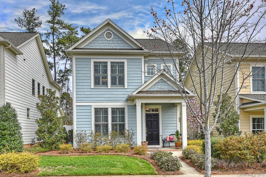 ABSOLUTELY Adorable Home set on quiet street in desirable Baxter!  Hardwoods flow in main living level, plantation shutters afford privacy & Kitchen with bkfst bar, granite,ss appliances & tile accents is ready for the gourmet chef! Open concept for dining, relaxing and sunroom/reading area affords additional flex space.Elegant Master with 2 closets/tray ceiling/tiled bath. Yard maintenance, green home.  Easy access to amenity rich Baxter's pool, playgrounds, walking trails & Town Center.