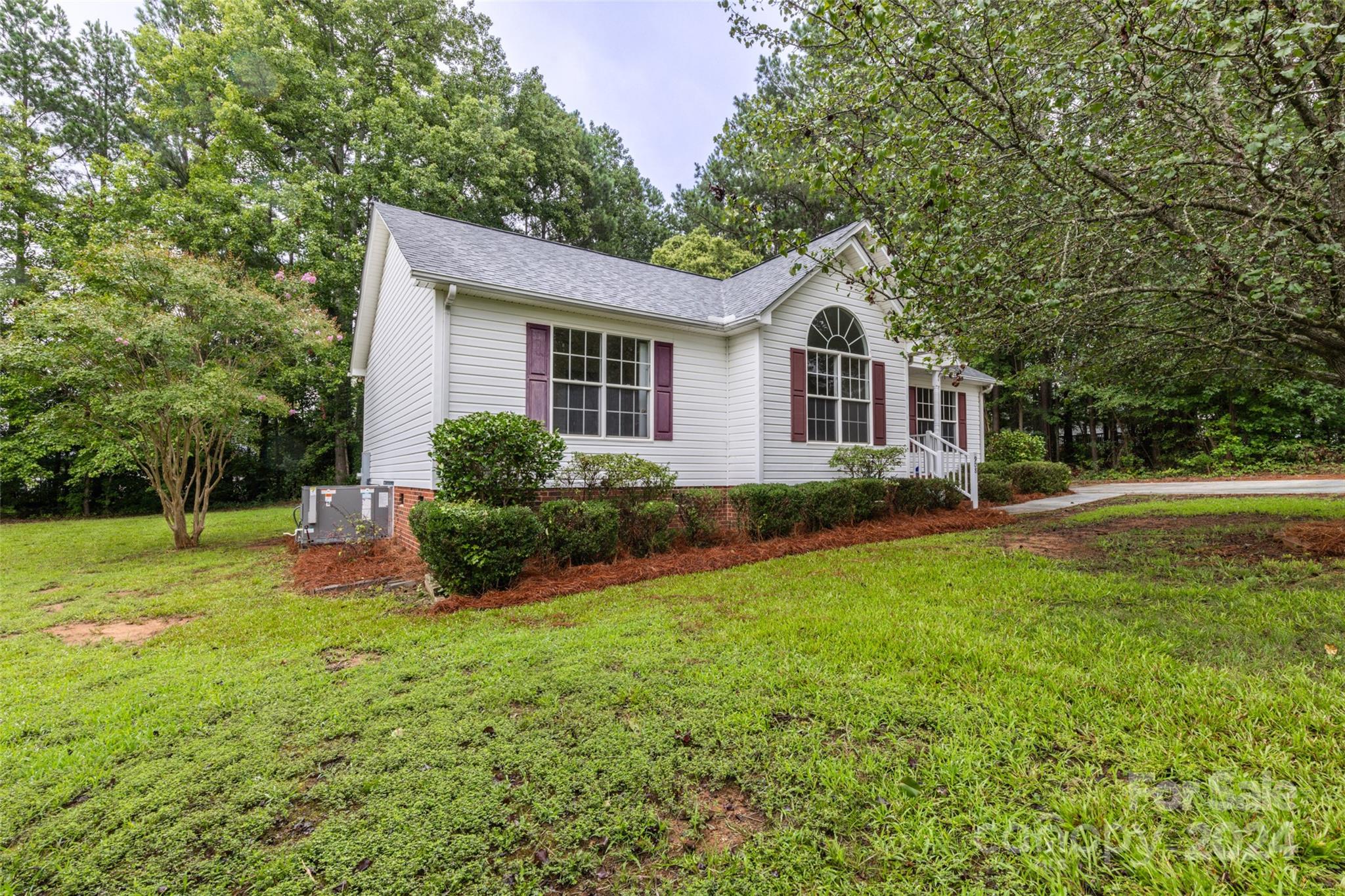 Make 908 Blackstone Lane in Rock Hill, SC your new home! This well-maintained, one-owner property features 3 beds, 2 baths, and 1,254 sqft of living space. Enjoy a split bedroom plan for added privacy, a cozy fireplace, and a spacious laundry room. Recent upgrades include a roof and HVAC system installed in 2021 for peace of mind. The .61-acre lot offers a tree-lined backyard with a covered deck, already set up for an aboveground pool—perfect for endless fun! Just 5 minutes from I-77 and 10 minutes from downtown Rock Hill—plus, no HOA! Don’t miss this opportunity!