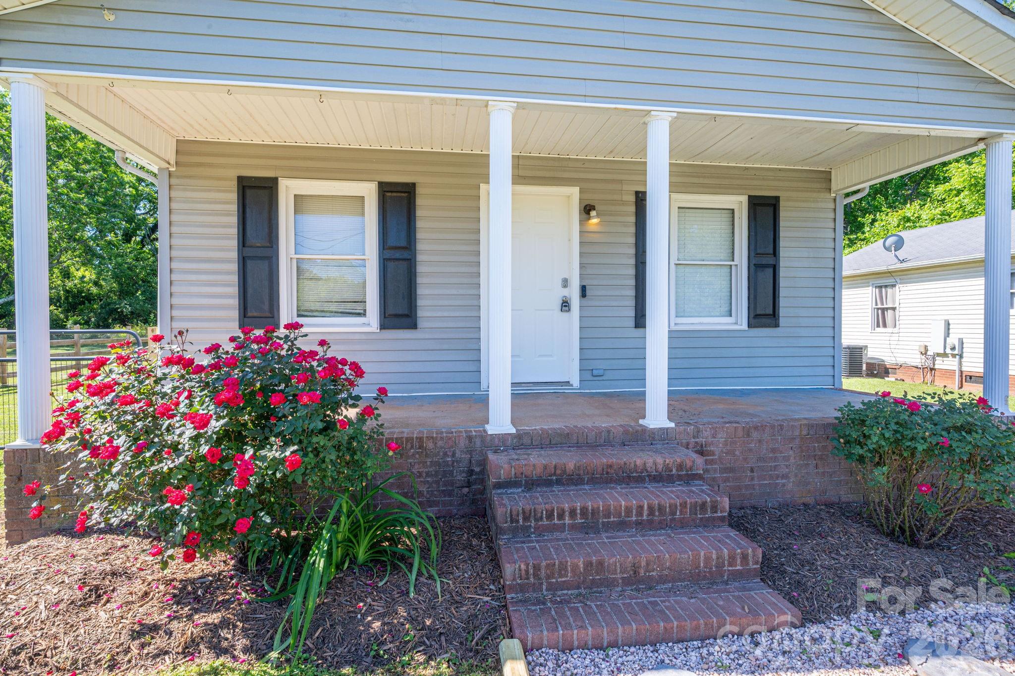 Welcome to easy living in charming Bessemer City! This 2-bedroom, 1-bath home packs plenty of style and functionality into its well-designed 768+/- square feet. Inside, you’ll love the updated kitchen featuring butcher block countertops, bar seating area, and modern finishes that flow seamlessly into the living space. Durable LVP flooring runs throughout much of the home for a clean, low-maintenance feel. Relax on the inviting front porch or enjoy the fenced backyard — perfect for pets, entertaining, or small garden. Whether you’re looking for a starter home, downsizing opportunity, or investment property, this one is full of charm and move-in ready appeal!