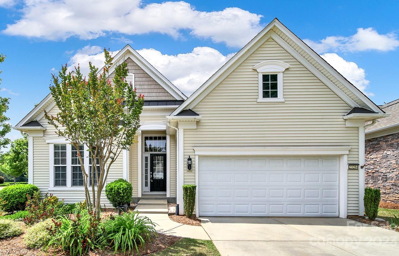 MOVE-IN READY! Premium waterview home in amenity-filled Sun City Carololina Lakes with serene views of the Lake House! This open Willow Bend home boasts lots of natural light & gleaming wood floors throughout the main level. Enjoy your gourmet eat-in kitchen complete w/granite countertops, breakfast nook, stainless steel appliances, kitchen island, & computer niche. Dining area & great room present the perfect open space for entertaining. Primary suite is nestled privately off the back of the home w/tray ceiling & ensuite bath. Split secondary BR & Flex space w/double glass doors perfect for office, study or craft room. Enjoy a morning cup of coffee or late afternoon beverage on your upper or lower patio overlooking the water. Unfinished walk-out basement perfect for storage! Refrigerator & washer/dryer included. In-ground irrigation with w/separate meter. Minutes from shopping, grocery & restaurants. Don't miss out on this rare opportunity!