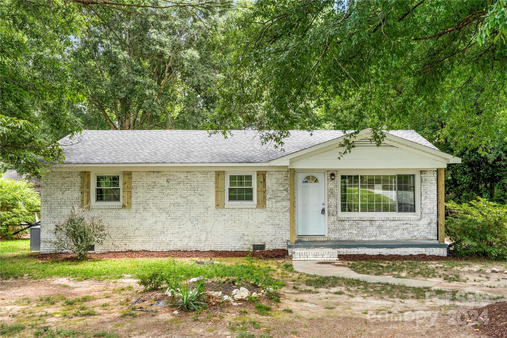 Welcome to this charming country cottage get away, offering stunning views from the front porch and a spacious backyard with endless possibilities for outdoor enjoyment. This brick ranch has been completely updated with new plumbing, electrical full interior update, new hvac and roof being only a few years old! Located just minutes from the highway, it boasts a fenced backyard with a storage shed and beautiful shaded trees. The fully updated interior includes an in-house laundry room. Come get away and enjoy this country charmer! 

Lender can provide 1 year buy down & offering 1 year home warranty!

Back on market no fault to seller heres your second chance!