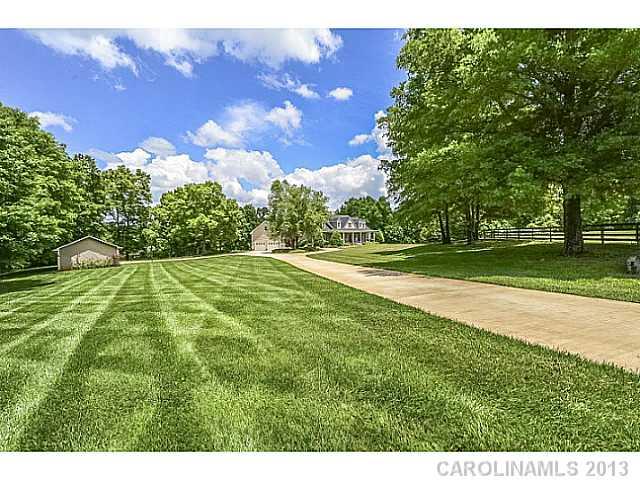 Beautiful Country Estate with Guest House, Private Lake & Acreage!  "Mountain Lodge" vaulted Great Room with beautiful cedar paneling, floor to ceiling stone fireplace.  Master & Guest suites plus Study on main level.  2108 sf Guest House with master on main attached by breezeway!  Screened porch, boat house, separate carport/workshop! Additional 10 acres & horse barn also available for purchase.