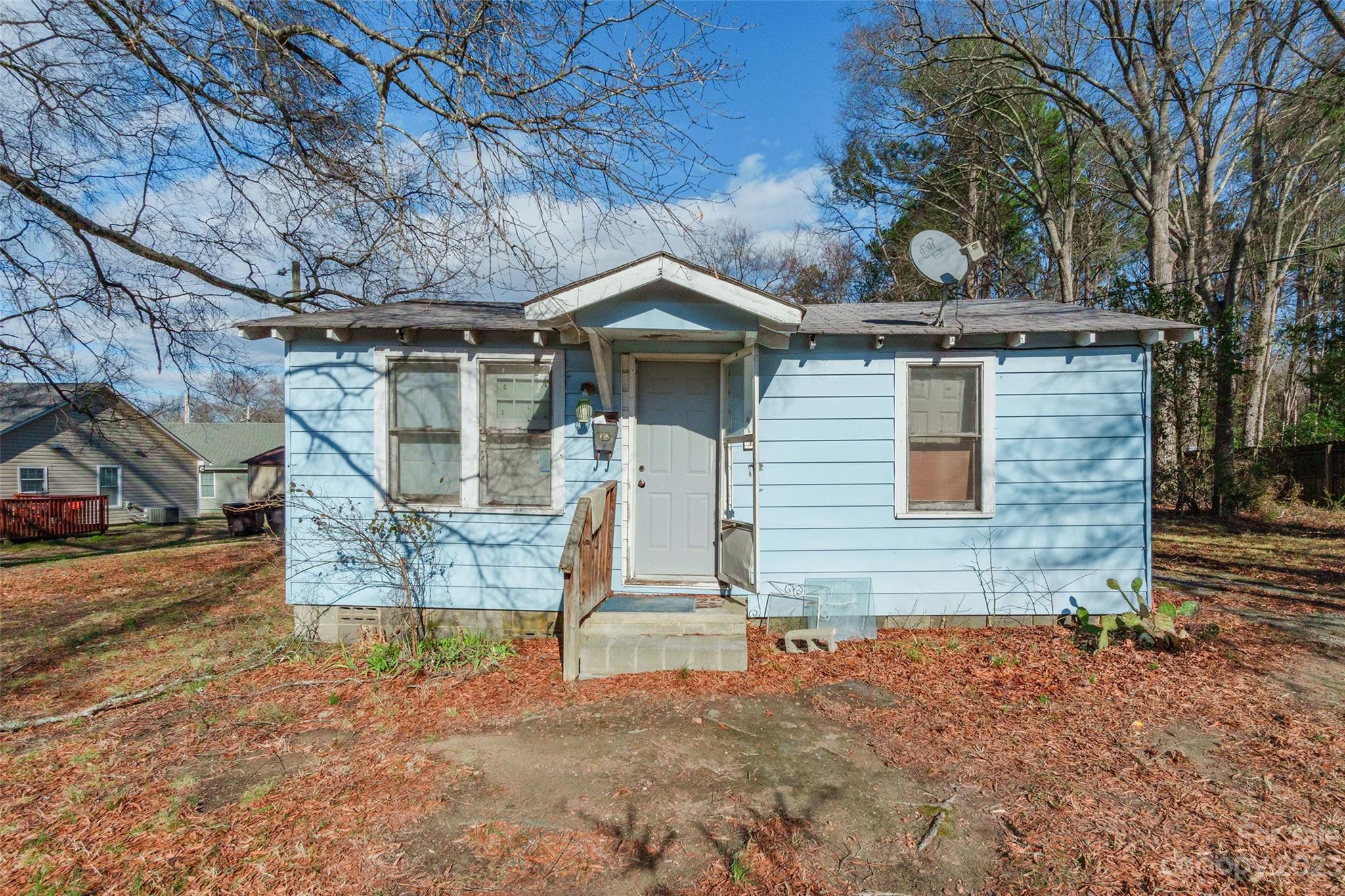 Unlock the potential of this inviting 2 bedroom, 1 bath home nestled in the prime Rock Hill area. Boasting a blank slate, this property offers an exceptional opportunity, providing you with the canvas to shape it into a lucrative venture or an ideal starter home. The interior renovations have commenced, showcasing new sheetrock that lays the foundation for a personalized touch. Revel in the freedom to design and create a living space that mirrors your unique style and preferences. With its strategic location near shopping and dining, seize the opportunity to transform this house into the perfect investment or starter home!  Seller is offering the home As-Is. Repair/building materials do not convey.