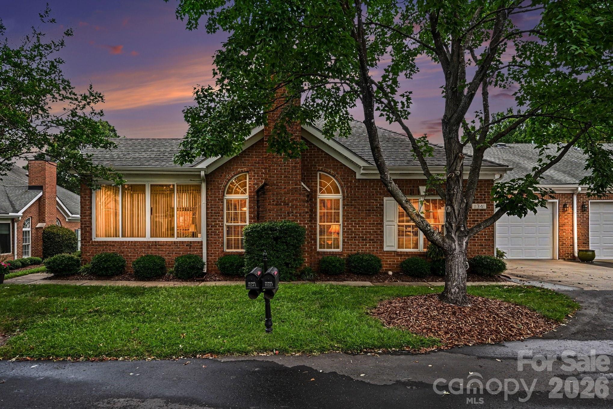 Welcome to the Village of Troon, one of Ballantyne's most desirable low-maintenance communities. This full-brick home offers easy one-level living with a spacious, open layout highlighted by a soaring cathedral ceiling in the living room, a two-car garage, and the peaceful setting that makes Troon so special.

A screened in porch is perfect for enjoying the Carolina weather year-round.
The HOA covers water, sewer, internet, cable, exterior maintenance, landscaping, and offers a clubhouse and a community pool, allowing you to spend more time enjoying life and less time maintaining your home. Ideally located just minutes from Stonecrest shopping, Blakeney Town Center, The Bowl at Ballantyne, and I-485, you'll have some of Charlotte's best shopping, dining, and entertainment just around the corner! 

This home has been thoughtfully updated and is move-in ready. The kitchen was renovated in 2025, the interior was freshly painted in 2024, and the HVAC and furnace were replaced in 2024. The 2022 washer and dryer, along with the refrigerator, are all included with the home, making your move even easier.