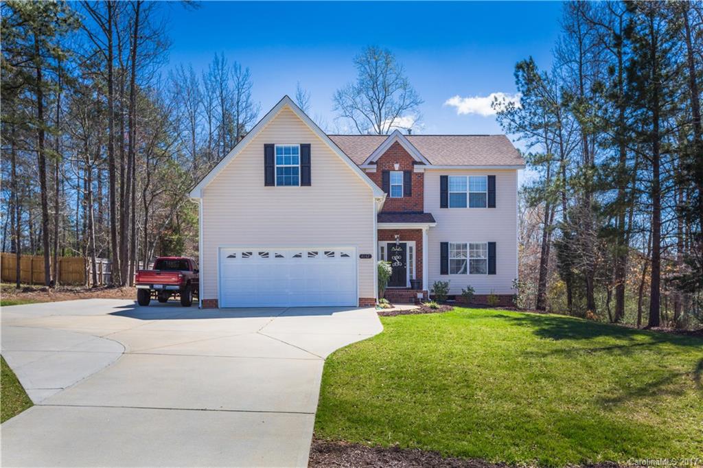 Long Day? NO WORRIES!  Welcome home to your back yard oasis located in Shiloh Commons!  Updated kitchen, fresh paint, corner fireplace-the inside is meticulous as the out!  This well maintained home will NOT disappoint! Fenced rear yard and exterior storage building. Yard extends beyond the fence! Additional parking pad added to the left of the garage for added parking convenience! Sellers have thought of everything to make this home YOUR DREAM HOME!  See tour for a full walk of this property!