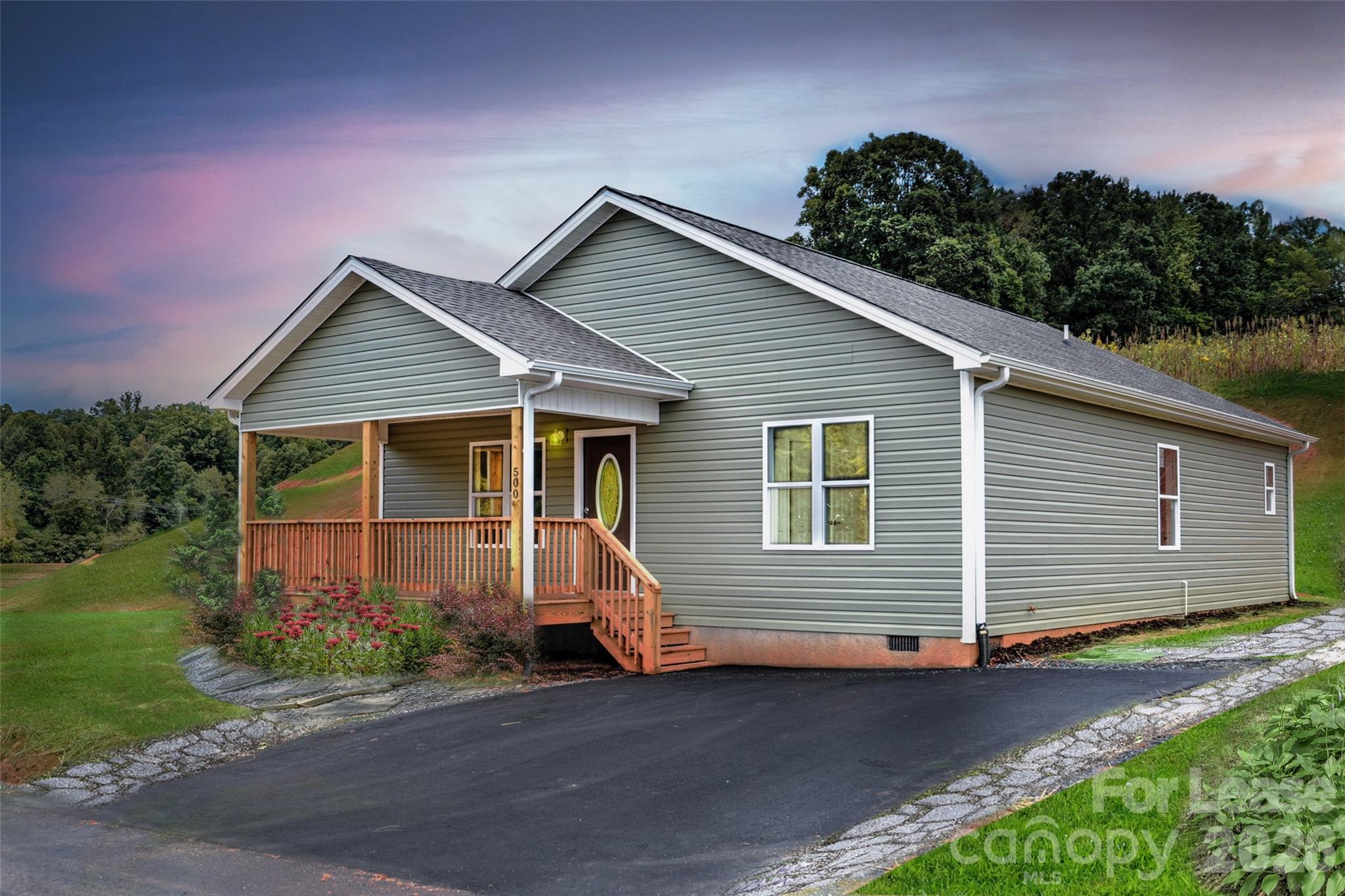 Escape the traffic come be a part of small town life just 20 minutes to downtown Asheville. New construction in  conveniently located new home community in Mars Hill. This site built home offers open floor plan, luxury waterproof vinyl plank flooring throughout, granite counter tops, stainless appliances, 2x6 exterior walls, and a front porch perfect for rocking chairs.  The community offers paved roads, high speed fiber optic internet, green space and all city services, including water/sewer, free trash pickup and free curbside recycling. Close to schools, restaurants and shopping.