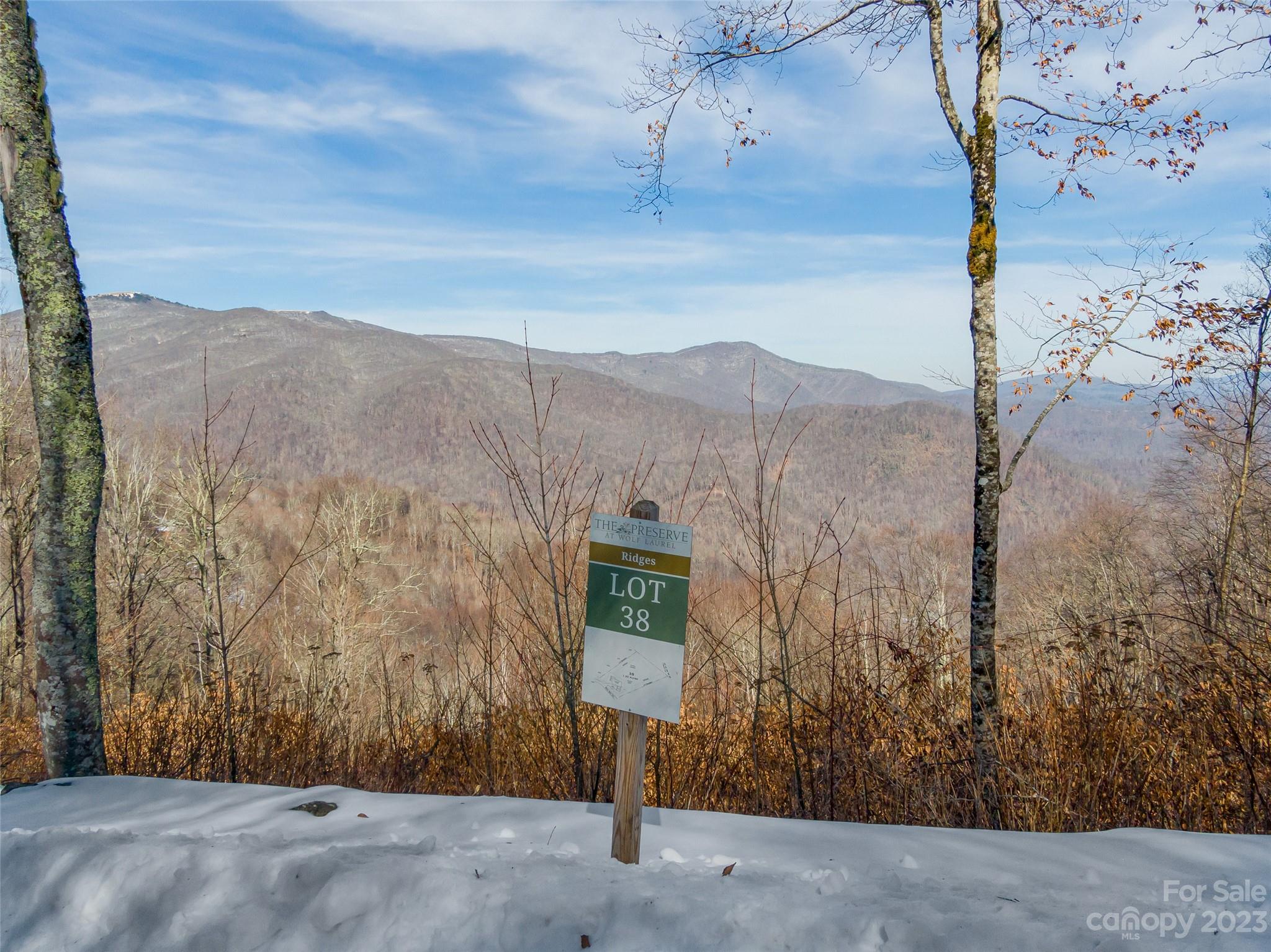 Come breathe in the mountain air at The Preserve at Wolf Laurel! A new home community that offers optional access to adjoining Wolf Laurel Country Club, hiking and ATV trails, and more! The development is surrounded by 700 acres of Conservation Land yet is a 30 minute drive to Asheville and only a 15 minute drive to Town of Burnsville. This lot is perfect for those who are looking for views and higher elevations. Come for a tour and enjoy some time on the mountain!