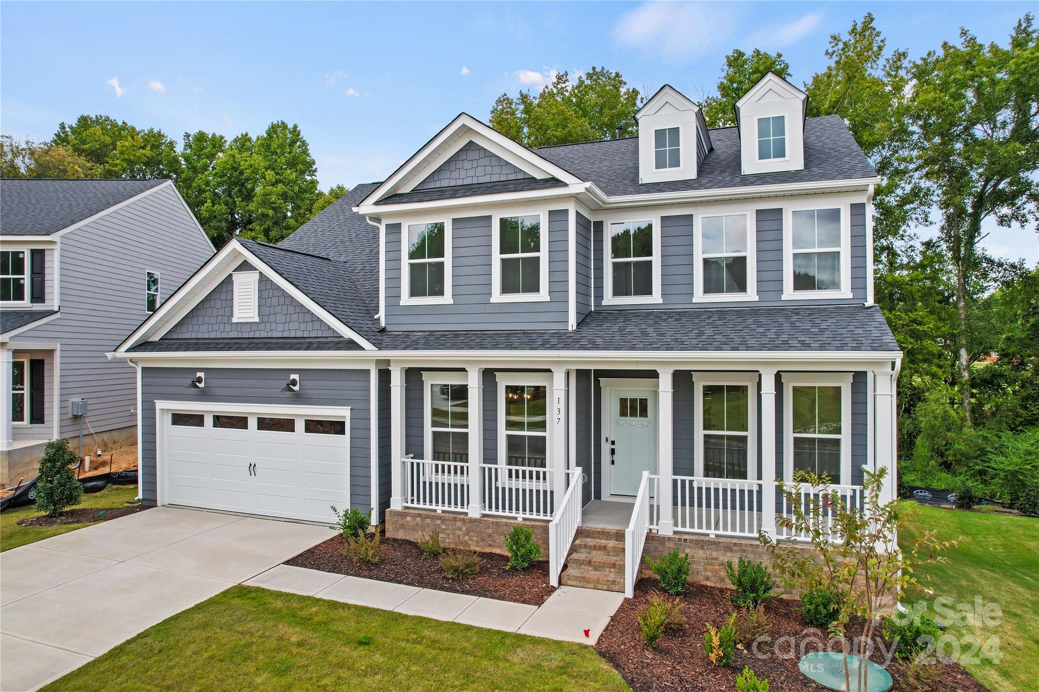 Final Basement Opportunity at Patterson Pond!  This rare finished basement home is located in the intimate Patterson Pond community in Fort Mill.  This magnificent home has everything you have dreamed of and more. As you enter the welcoming Foyer, you are greeted with a beautiful Dining Room with tray ceiling adjacent Butler's Pantry, great for entertaining family and guests.  The open floor plan invites endless memories to be had in the gorgeous Gourmet Kitchen, Cafe and Gathering Room with exquisite brick fireplace.  First floor also features a Guest Suite as well as a Library/Office.  And let's not forget the stunning Sunroom where you can take in the the natural views of the trees just behind this breathtaking homesite.  Head upstairs to enjoy the Loft, three additional Bedrooms and Owners Suite with spa-like bathroom.  All this, plus a finished basement with another full Bedroom and Bath and huge Rec Room perfect for a pool table or movie room.  Amazing Fort Mill Schools!