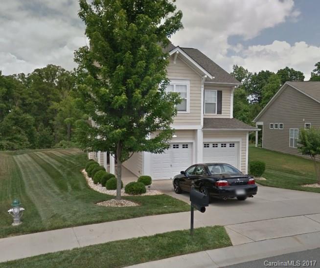 Don't miss out on this 2 story home in Ridge Pointe that backs up to woods! Features 3 BR, 2.5 BA, hardwood floors throughout downstairs, open concept & 2 car garage. You'll instantly notice fresh paint & all new carpet upstairs. Snuggle up by the gas log FP in the living room to relax & unwind, just in time for cooler weather. The loft area makes extra living space for a 2nd living room, movie room or office. Master & all BRs are upstairs along w/laundry. This one sparkles & is ready to fly!