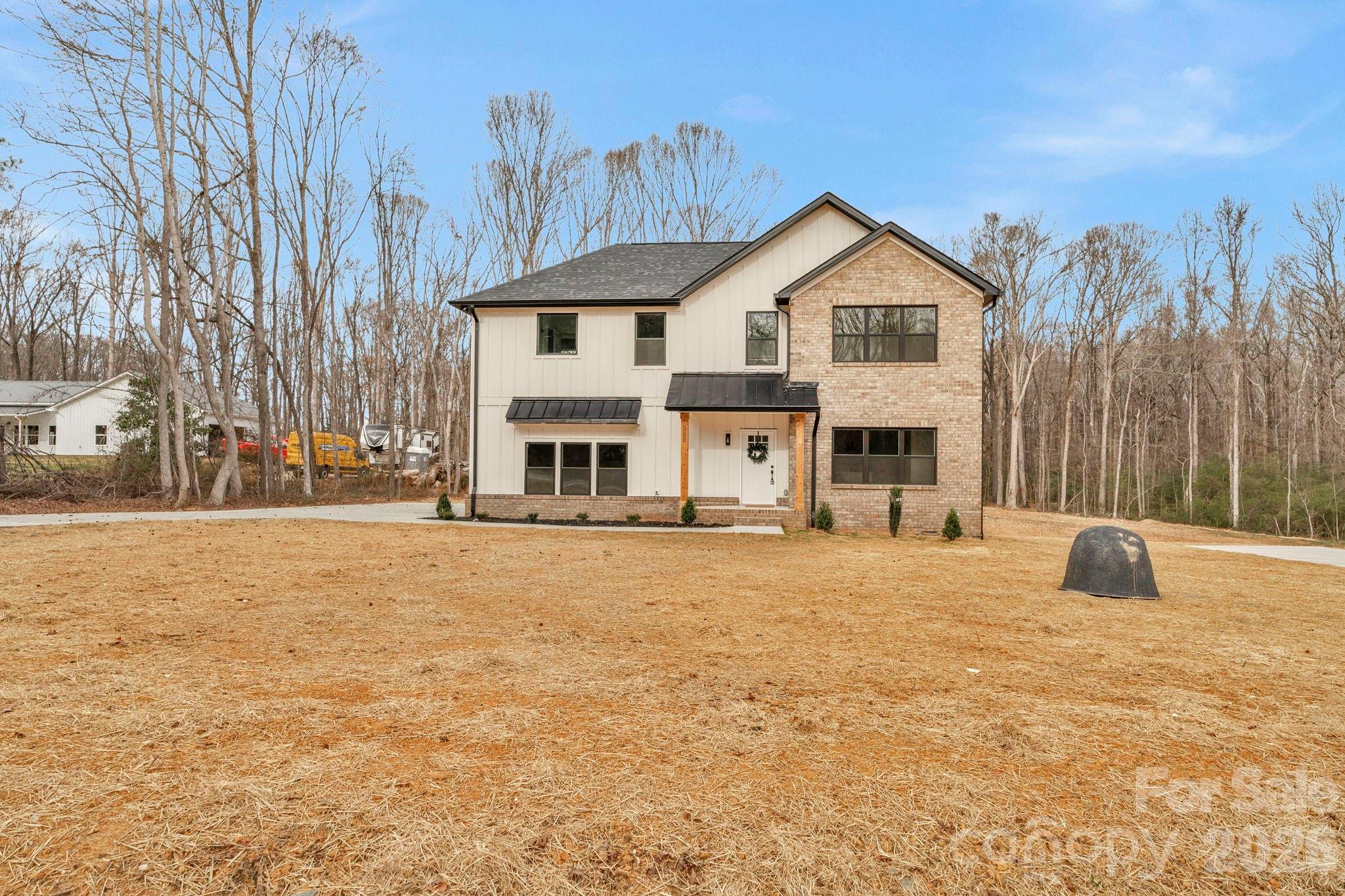 Welcome to your private retreat in one of Waxhaw’s most desirable areas. Situated on over 4.5 beautiful acres in an excellent location, this two-story home offers the perfect blend of space, privacy, and potential. This property provides a rare opportunity to enjoy peaceful country living while remaining close to all the charm and conveniences Waxhaw is known for.  This home features 3 bedrooms plus an office on the second level and a generous living space on the main level.  A rare opportunity to own acreage, space, and location in Waxhaw—don’t miss it.