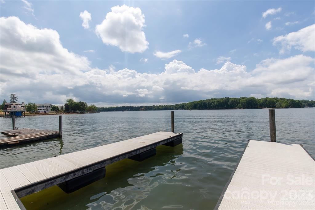 Fabulous one of a kind WATERFRONT Lot located in the Exclusive Copper Ridge Subdivision. Pier, Boat dock, Deep water. Location, Location, Location! This one is the Perfect Location. Sits on a Peninsula down Alcove Rd, turn onto Templeton Rd. and left onto Camino Real Rd. left onto Sienna Pace. .66 acre lot has recently been surveyed and perc tested. Bring your own builder, no time frame to build. Buy now and build when your ready! New homes recently built nearby are millions and up. (WAY UP!) Within miles of hospital and I-77. 
Yet, nicely tucked into this Oasis of Paradise! You have the opportunity to buy this lot and the two lots that are located next to this lot for a total of 3 lots for a total of 1.85 acres for $1,500,000. or purchase this lot. The possibilities are endless!