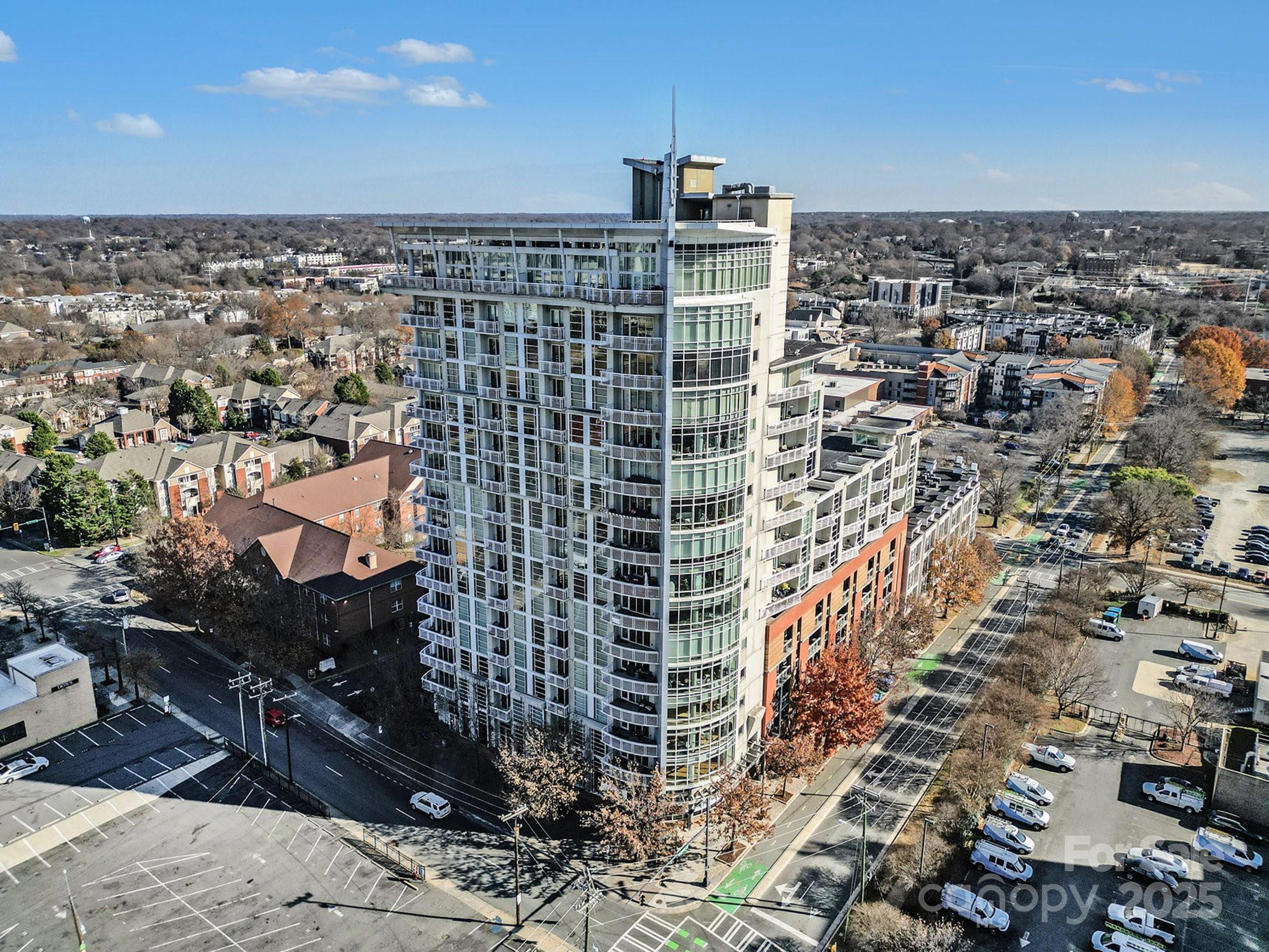 MOTIVATED SELLER!   Don't miss this opportunity to affordable living in the heart of Charlotte.   This spacious third-floor condo with an open floor plan is perfectly located to give you the convenience of uptown living and still be just a few blocks away from all the hustle and bustle.  As a corner unit, this home offers privacy along with incredible skyline views of Charlotte.   Relax on your extended wrap-around deck for more panoramic scenes after a busy workday.  Unit 304 features 2 spacious bedrooms, two full baths,  large family room, kitchen, dining area and laundry room.   One of the best views in the city can be found on the roof-top terrace.  You also have 2 assigned parking spaces in the secured parking deck.  Minutes from everything that uptown Charlotte has to offer!  Per Chase bank this property is eligible for a CHASE HOMEBUYER GRANT up to $5000.00.  Ask Listing Agent about details.