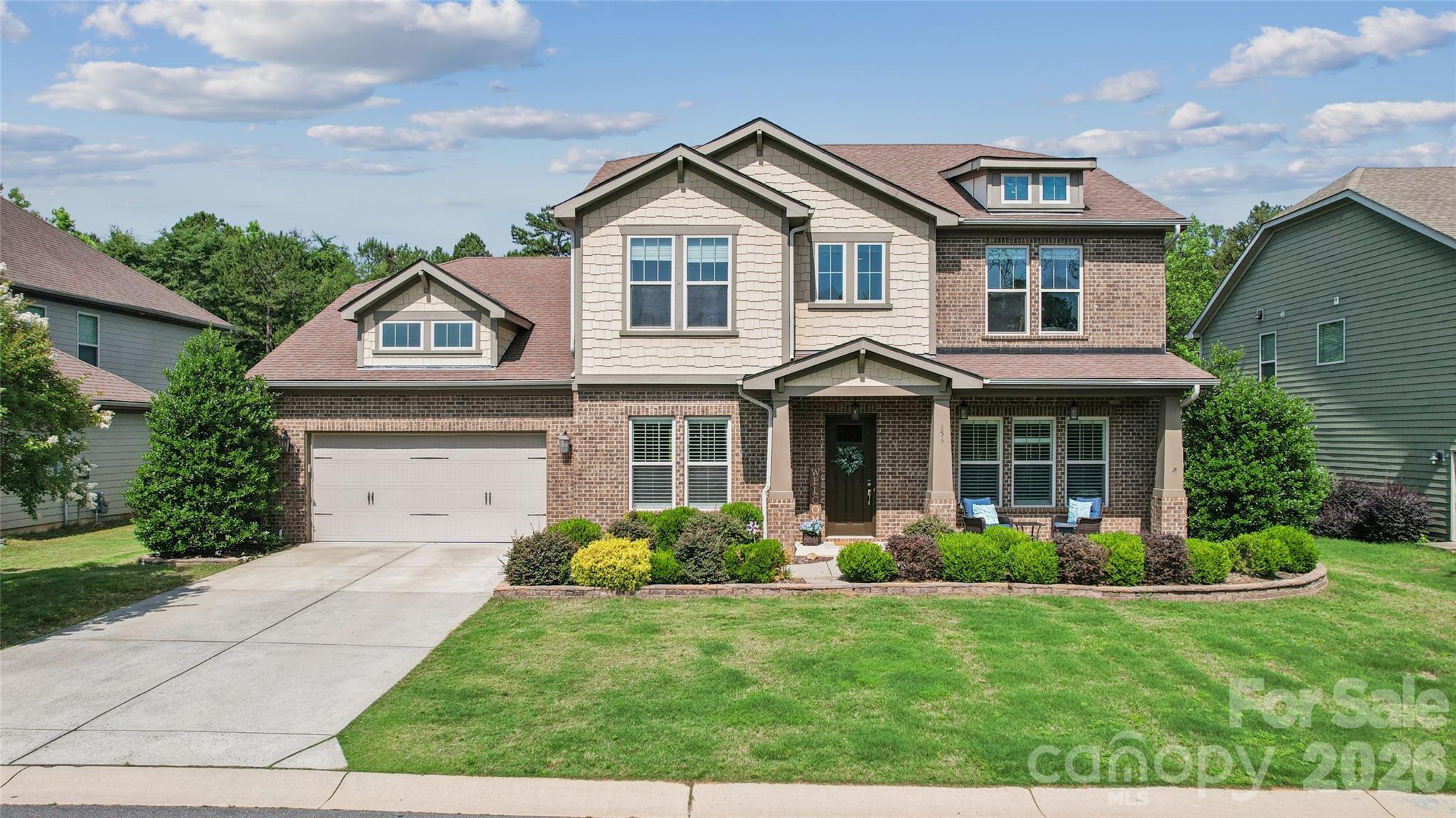 When we say "MOVE IN READY!" we mean it! The  former model being sold FULLY FURNISHED with many upgrades!!!  This spacious 6-bedroom, 4-bath home offers a thoughtfully designed layout with the primary suite conveniently located on the main level. The primary retreat features a large ensuite bath and an oversized walk-in closet, providing comfort and privacy. Also downstairs is a dedicated home office, a formal dining room, and a welcoming living room with a gas fireplace that opens seamlessly to the eat-in area and kitchen—perfect for both everyday living and entertaining. The chef’s kitchen is a standout, featuring a large breakfast island, granite countertops, tiled backsplash, stainless steel appliances, a walk-in pantry, and a butler’s pantry for added storage and prep space. A main-level laundry room includes the washer and dryer for added convenience. Upstairs, you’ll find four additional bedrooms, two full baths, and 2 expansive bonus area offering endless possibilities—ideal for a media room, game room, playroom, second living space, home theater, hobby studio, or flex space tailored to your lifestyle. Out back, enjoy a beautifully designed travertine tiled patio with built in BBQ area as well. The travertine continues as a walkway leading to a fire pit area overlooking a private, wooded backdrop filled with mature trees and abundant wildlife—perfect for relaxing or entertaining in a serene setting. Completing the home is a two-car garage and ample storage throughout. This home seamlessly blends space, function, and comfort in a picturesque setting. Also enjoy all the benefits of a vibrant community featuring a neighborhood pool and playground, river access, disc golf course, walking trails, sidewalks, and much more. Conveniently located near top rated schools, shopping, dining, and major routes, this home offers space, comfort, and community—all in one place.