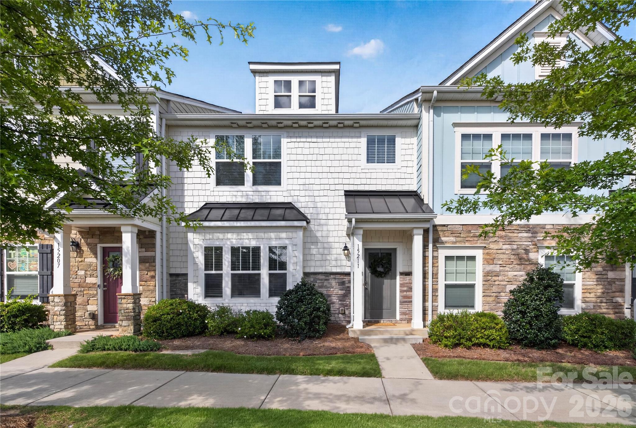 Available NOW for immediate Move-In! Welcome to this beautifully designed townhome in Bryton offering over 1,800 square feet of thoughtfully planned living space and a detached 2-car garage. This versatile floorplan features an open-concept main level with a spacious Dining Area that flows seamlessly into the Great Room and Kitchen, creating an ideal layout for everyday living and entertaining. The Kitchen showcases granite countertops, modern finishes, and ample prep and storage space. Upstairs, the expansive Primary Suite offers a large walk-in closet and an ensuite bath featuring a walk-in shower. Two additional bedrooms, a full secondary bath, and a conveniently located laundry area complete the second floor. Enjoy access to Bryton’s community amenities including a pool, dog park, picnic area, and playground. Conveniently located in Huntersville with easy access to I-485 and I-77, plus proximity to shopping, dining, recreation, Lake Norman, and Uptown Charlotte. Combining functional design, modern finishes, and a connected location, this townhome offers exceptional everyday convenience.
