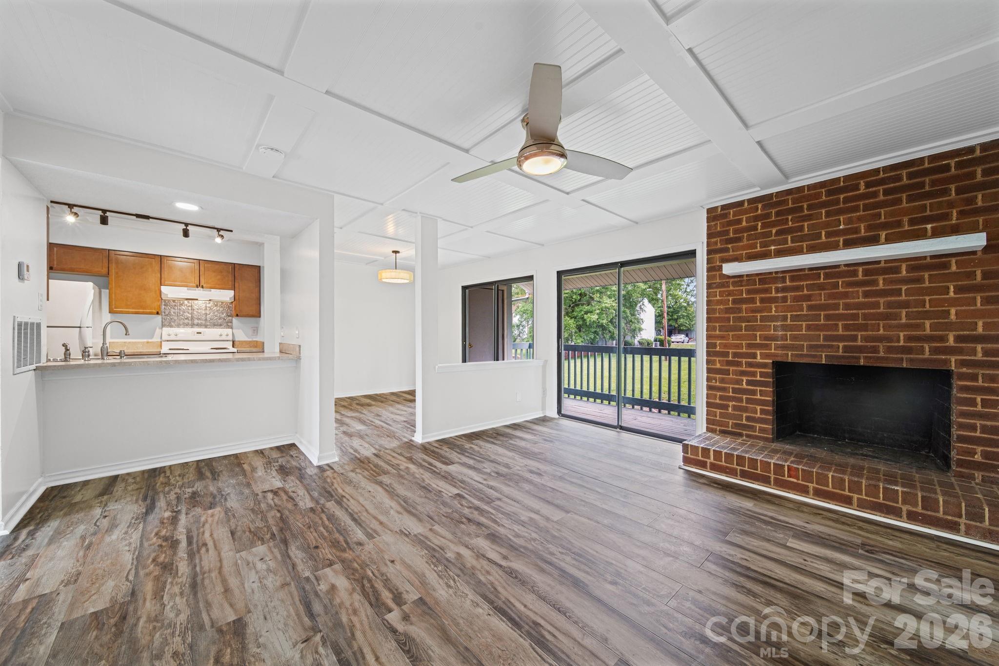 Welcome to 11023 Harrowfield Rd, a well-maintained 3-bedroom, 2-bath condo offering comfortable living with tasteful updates throughout. Fresh neutral colors and new flooring create a clean, modern feel, while the custom ceiling detail adds character and visual appeal to the main living space. The functional layout includes a spacious living room, dining area, and kitchen designed for everyday living and easy entertaining. The primary bedroom features a private full bath, while two additional bedrooms and hall bathroom provide flexibility for guests, a home office, or hobbies.  Enjoy outdoor living from the welcoming front porch or relax on the back balcony, offering options for morning coffee or evening downtime.  As an added bonus the seller is offering $3,000 toward the buyer’s closing costs to help with new countertops! Conveniently located near shopping, dining, and major roadways, this home offers both comfort and accessibility. Minutes from Ballantyne, Pineville and SouthPark!