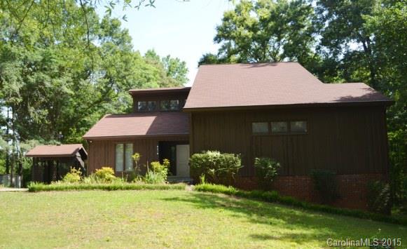 One really BIG house on an acre lot! Huge vaulted Great room with fireplace, and formal dining room. Upgraded kitchen with double oven, ceramic tile back splash, and upgraded baths with tile floors! Three spacious bedrooms with three full baths. Brand new deck, tons of storage, finished rec room with fireplace, spacious basement with tons of potential! Must see!