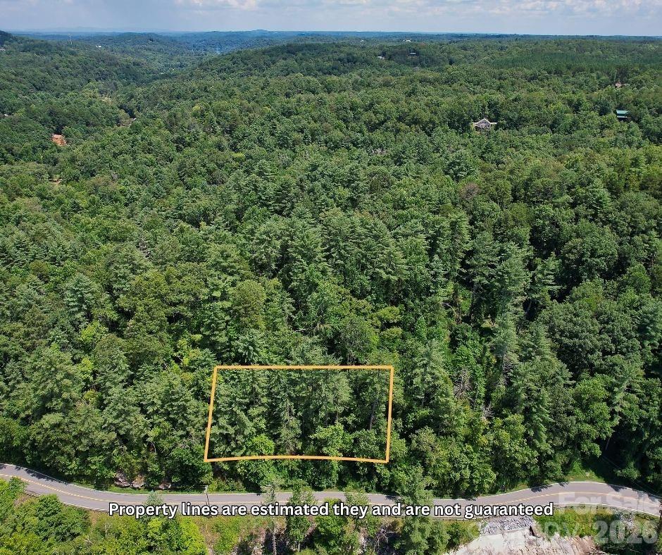1.71-Acre Lot in Scenic Riverbend at Lake Lure – Build Your Dream Retreat!

Discover the perfect canvas for your mountain getaway or forever home in the beautiful Riverbend at Lake Lure community. This expansive 1.71-acre wooded lot offers privacy, tranquility, and stunning natural surroundings just minutes from the crystal-clear waters of Lake Lure.

Nestled in a gated community, Riverbend features two private lakes, a swimming hole, hiking trails, a picnic pavilion, and the serene Broad River – perfect for fishing, kayaking, or simply relaxing. With gentle terrain and multiple potential building sites, this lot offers flexibility for your dream home design.

Enjoy mountain living while still being conveniently located near Chimney Rock, restaurants, shopping, and outdoor recreation. Whether you're planning a vacation retreat or a full-time residence, this lot provides the peace and beauty of nature with the perks of a well-maintained community.