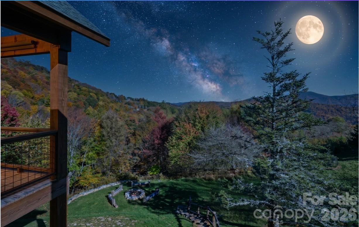"Escape to 'Amazing View Lodge,' a big, beautiful 4-bedroom 4.5-bathroom (each bedroom has an ensuite bathroom) cabin where luxury meets the landscape in perfect harmony. This custom-built retreat offers an experience beyond compare, with a sprawling deck that serves as your private viewing platform for stunning mountain views and stargazing, or enjoy an evening with a warm fire, crisp air, and endless skies at the firepit. Inside, a stone fireplace and rich wood finishes create a cozy yet grand atmosphere, while multiple living spaces provide ample room to relax and reconnect. A kitchen designed for both serious cooking and relaxed gathering, it boasts a spacious layout with a generous island, a gourmet range, and custom Koch rustic cherry briarwood cabinetry. The lower-level offers a sprawling family-friendly oasis designed for both relaxation and entertainment. Gather around the cozy fireplace for a movie night or head to the dedicated game area for endless fun. This impressive space is complemented by two bedrooms, each with its own full en-suite bathroom. From the moment you arrive, you'll be immersed in a world of tranquility, framed by some of the most amazing views the region has to offer." Located in Banner Elk minutes to downtown, Beech Mountain and the area ski resorts! An incredible home built with superior wall foundation, 8" easter white pine double V authentic exterior corners, all logs are clear treat pressure treated at factory, spray foam insulation on roof deck for exceptional insulation values, a Generac 22kw whole house backup generator serviced annually, whole house dehumidification tied into the HVAC system. Short-term rental projection up to 65K! A truly gorgeous mountain home awaits you! Furnished with a few exceptions! Seller is an NC Broker