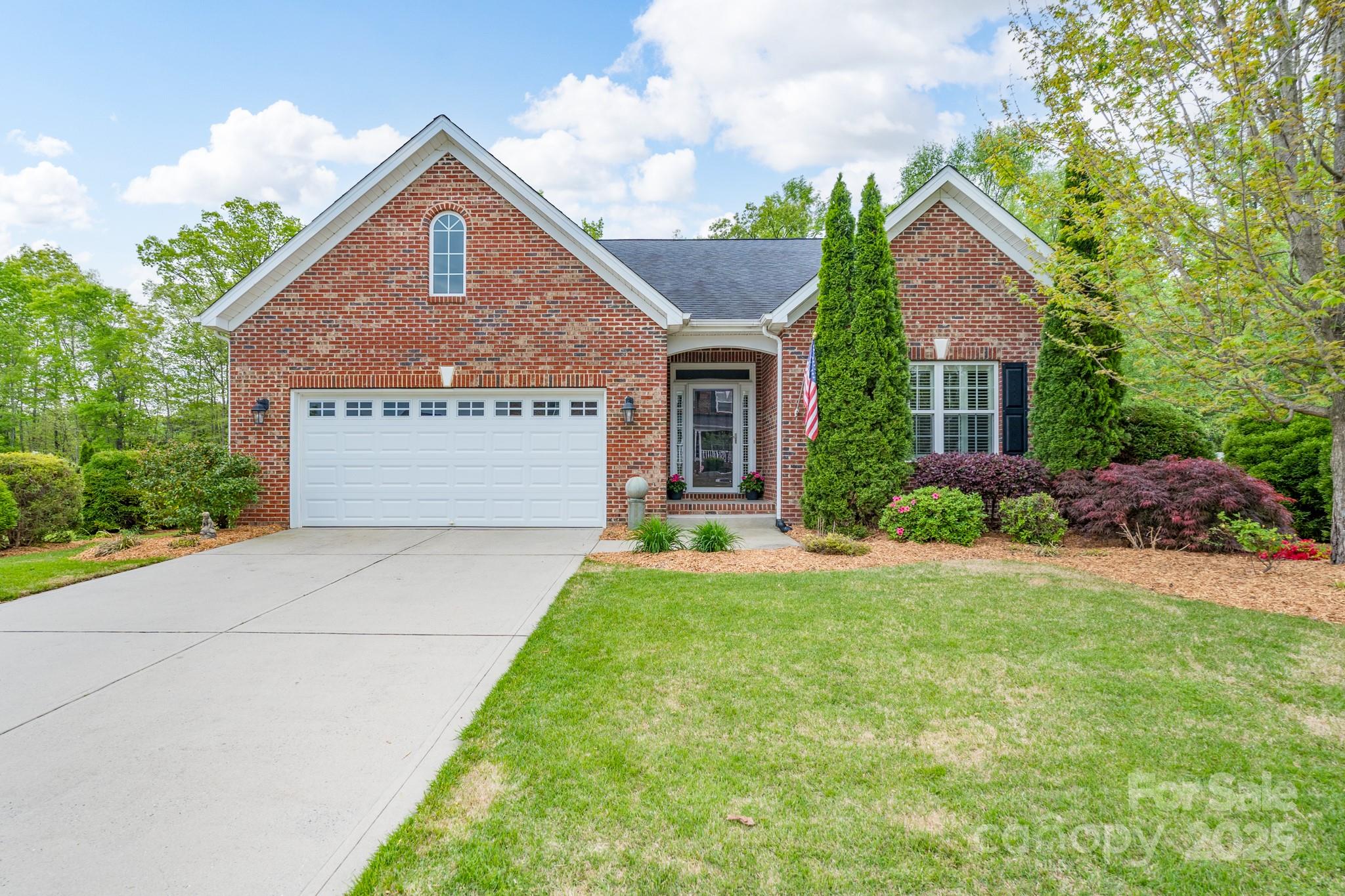 This one-story home is going to simply impress you! As you enter the front door, you will feel the warmth and care it has been provided by the original owners. Beautiful hardwood floors are throughout the main living areas, including all bedrooms. You can easily entertain with the openness of the kitchen, family room, and dining area. With granite countertops and beautiful cabinets, the kitchen will make preparing meals a breeze. Warm up on the cool nights in the family room by the fireplace with gas logs. Enjoy the primary bedroom with attached bathroom, featuring a custom tile shower. The split bedroom plan also includes two additional bedrooms that share a hall bath. Begin each morning or end the day relaxing on your screened porch overlooking the fenced backyard. The manicured lawn and landscaping provide curb appeal that is sure to catch the eye of everyone. A double garage is a bonus to this home located in a great neighborhood with a new community pool currently being installed.