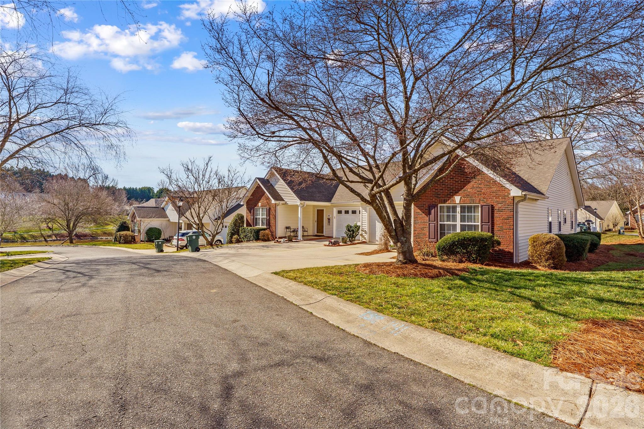 Meticulously maintained and thoughtfully priced, this 2-bedroom, 2-bath duet-style patio home offers easy, low-maintenance living in a desirable and very active 55+ community. The charming side/back porch is perfect for morning coffee, while the yard enjoys peaceful pond views and a prime corner location near the cul-de-sac.  Inside, you’ll find a comfortable, functional layout designed for everyday living. Outside? Lawn maintenance is included—so you can skip the yard work and enjoy the lifestyle. Apollo gas heating system makes for an excellent warm home and great hot water! Mailboxes just outside the door of this patio home. Ample parking with 1-car garage and oversized driveway. Residents enjoy access to a community clubhouse (offering a fitness center, calendar of events/activities, library and mingling with the neighbors), serene trails throughout community, gazebo, pond, sidewalks, street lighting, park benches throughout neighborhood and Boat/Trailer/RV storage. I-77, Lake Norman, Doctors Offices, Grocery Stores, Lake Norman-Duke Hospital, Houses of Worship, and Restaurants are within minutes of this home. A fantastic opportunity to embrace simplified living in a welcoming neighborhood setting! Call today for your private showing!