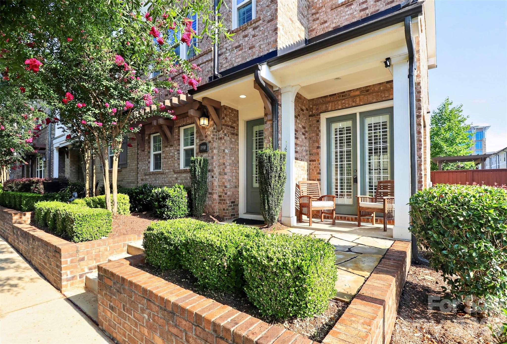 Welcome home!  Step inside this end-unit townhome in the highly sought-after Waverly community and get ready to call it home!  Ideally located in one of South Charlotte’s premier neighborhoods, this move-in-ready David Weekley home is just a stones throw from Waverly’s popular shopping, restaurants, grocery store, fitness studios, entertainment, and everyday conveniences, with easy access to I-485 and major commuter routes.

Designed for modern living, this beautifully upgraded 3-bedroom, 2.5-bath home features an open floor plan with soaring ceilings, abundant natural light, and premium finishes throughout. The gourmet kitchen is a standout with professional-grade stainless steel appliances, granite countertops, designer tile backsplash, an oversized center island, and a huge walk-in pantry—perfect for entertaining and everyday living.

The spacious upper level offers a versatile loft, dedicated computer niche, and a luxurious primary suite featuring a spa-inspired upgraded bathroom and a large walk-in closet with custom built-in shelving. Two additional bedrooms provide flexibility for family, guests, or a home office.

Enjoy outdoor living in the private fenced side yard with upgraded stone pavers, ideal for relaxing or entertaining, or watch the world go by from the front patio.  Additional highlights include a two-car attached garage, exceptional builder upgrades, plantation shutters and meticulous maintenance throughout.

This exceptional Waverly townhome truly has it all. Schedule your private showing today!