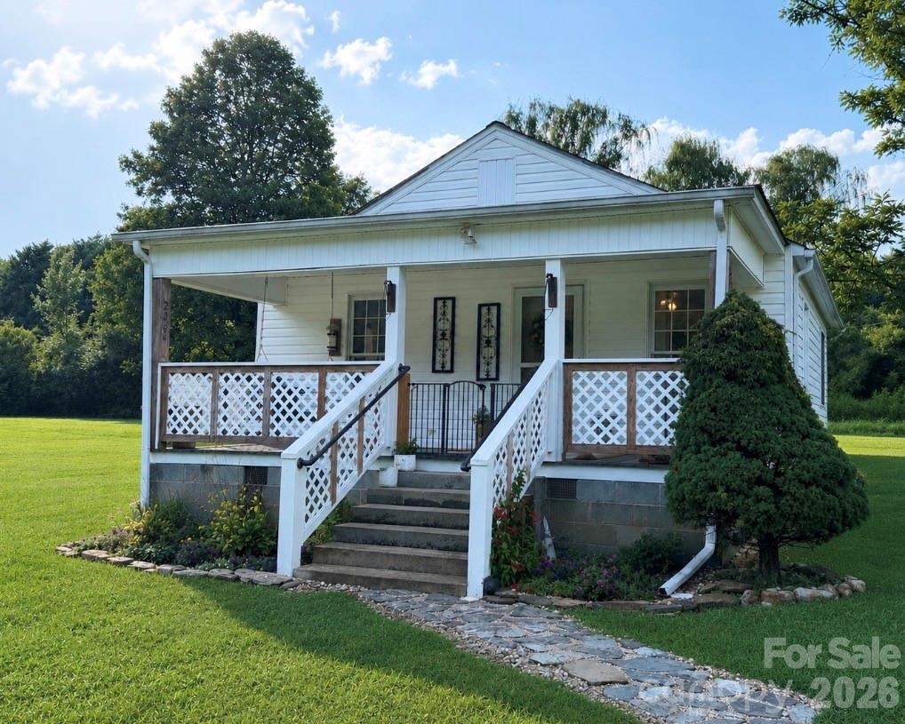 AFFORDABLE LIVING IN HAPPY VALLEY!!! Close to 321 and Only 20 Minutes from Blowing Rock! A Perfect Starter Home or Investment Property, this Remodeled House Features Very Spacious Rooms and Many Updates! Replacement Windows, A New Roof in 2019, New HVAC and Flooring in 2021, and a New Hot Water Heater in 2023! Beautiful Perennial Flowers, Established Garden Space, and Happy Valley Living on a Dead End Street! Enjoy Your Coffee on a Dreamy Covered Front Porch...Perfect for Quiet Mornings! With a One Level Living Home, Enter into a Spacious Living Room, Filled with Natural Light, that leads to a Kitchen with Ample Cabinet and Counter Space! Appliances Included! The Primary Bedroom is also on this level and adjacent to a Roomy and Updated, Full Bathroom/Laundry Space! Desirable Location, Desirable Updates and Desirable Price...Hurry to Make This Property Yours!
