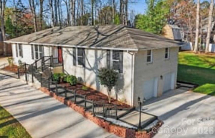 Welcome to a one-of-a-kind property where character, comfort, and outdoor living come together seamlessly. 
Fully remodeled 3,234 sq ft home on nearly 1 acre in a quiet, no-HOA neighborhood. Features include a new roof, updated flooring, improved insulation, renovated bathrooms, and modernized kitchens. Main level offers 3 bedrooms and 2 full baths.
The fully finished walkout basement with second kitchen, full bath, flex rooms, and large living area provides incredible flexibility—ideal for a mother-in-law suite, multi-generational living, Airbnb, or rental income opportunity.
Circular concrete driveway with ample parking. Outdoor living shines with a large deck, enclosed gazebo with outdoor kitchen potential, brick fireplace seating area, storage building, and spacious private yard surrounded by trees.
A rare opportunity to own a home that truly offers space, flexibility, and an exceptional indoor-outdoor lifestyle.