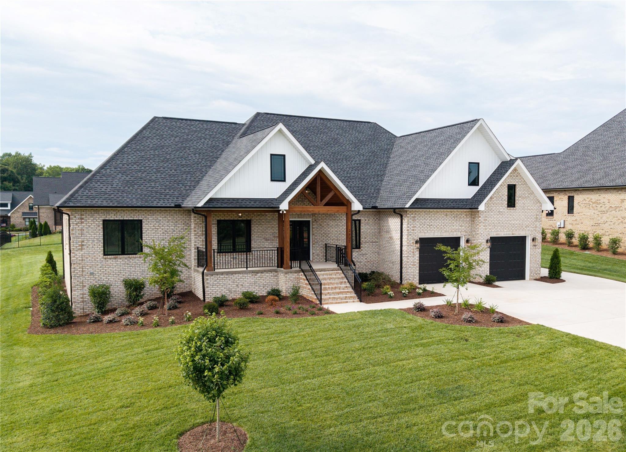 Enjoy the perfect blend of comfort and style in this beautiful new construction home featuring 3 bedrooms, 2.5 bathrooms, and a large bonus room upstairs that offers flexible space for a home office, playroom, or media room.

Inside, you'll find an open floor plan with a spacious great room, an electric fireplace, and a well-appointed kitchen with a large island, walk-in pantry, and plenty of cabinet space. The main-level primary suite includes a spa-inspired bath, and oversized walk-in closet! Main level living has never felt better with plenty of space for entertaining, and all charm you can desire for a cozy night at home. This beautiful new construction home offers 3 bedrooms, 2.5 bathrooms, and a thoughtfully designed floor plan that's perfect for modern living. The open-concept layout features a spacious great room, a stylish kitchen with a large island, and ample cabinet space, making it ideal for both everyday life and entertaining.

The main-level primary suite provides a relaxing retreat with a spa-inspired bathroom, oversized walk-in closet, and convenient access to the laundry room. Upstairs, a large bonus room offers flexible space for a home office, media room, or guest area.

Enjoy your morning coffee on the covered front porch or unwind on the covered back porch overlooking the open backyard.

Relax on the covered back porch overlooking the beautiful backyard, ready for your personal touch. With a spacious attached 2 car garage and 1 additional detached garage perfect for a workshop! With a location between Denver and Lincolnton near shopping, dining, healthcare, and Lake Norman, this home offers modern living in a growing community.