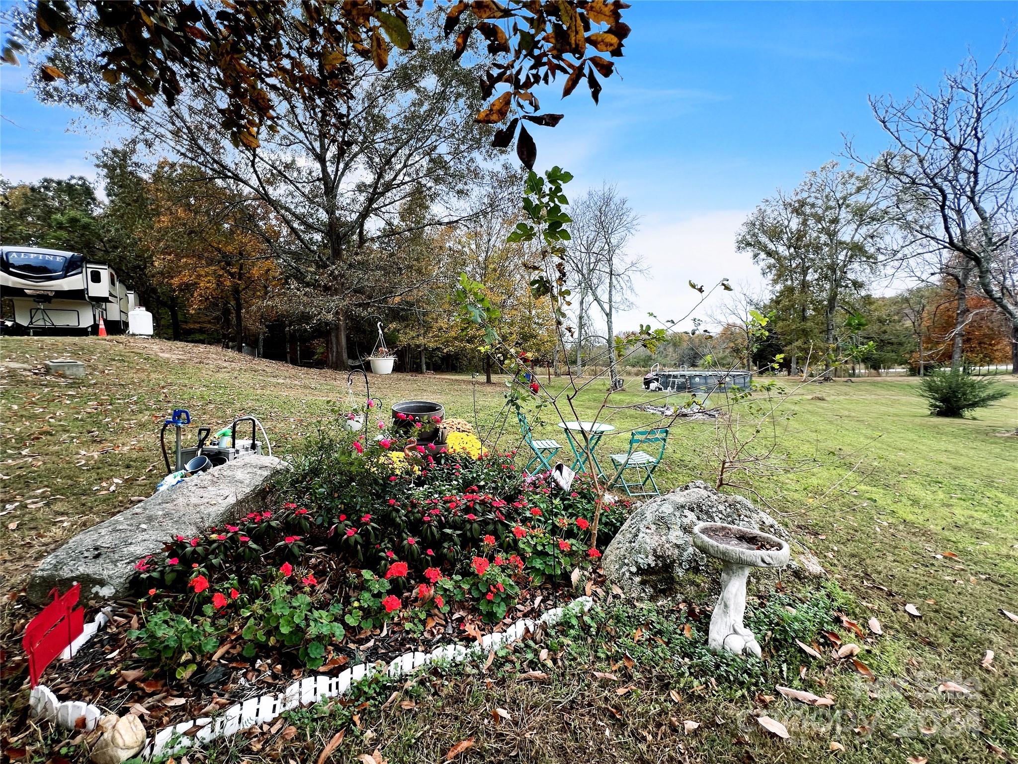 Welcome to 2814 Hart Rd, a hidden gem in Clover, SC, just off Black Highway. This unique 2.4-acre gated & fully fenced property provides privacy & tranquility amid nature while offering a mountainous feel. Just picture yourself relaxing atop the ridge surrounded by striking rock formations where the whispering winds & crisp Carolina breeze invigorates your soul. It doesn't stop here – for your outdoor enjoyment there is an above ground saltwater pool for those warm summer days. Family or friends visiting? No problem! RV parking area w/power, water, & septic. The well is over 200 ft deep! For your convenience there are multiple water hydrants throughout the property. There is also a workshop/barn & a shed w/power! Prepare to fall in love with this property! Whether creating your own Private Estate, Retreat or Hobby Farm, 2814 Hart Rd IS the perfect place to call home! Manufactured, Modular & Stick built home approved. Conveniently located to Clover for shopping and dining.