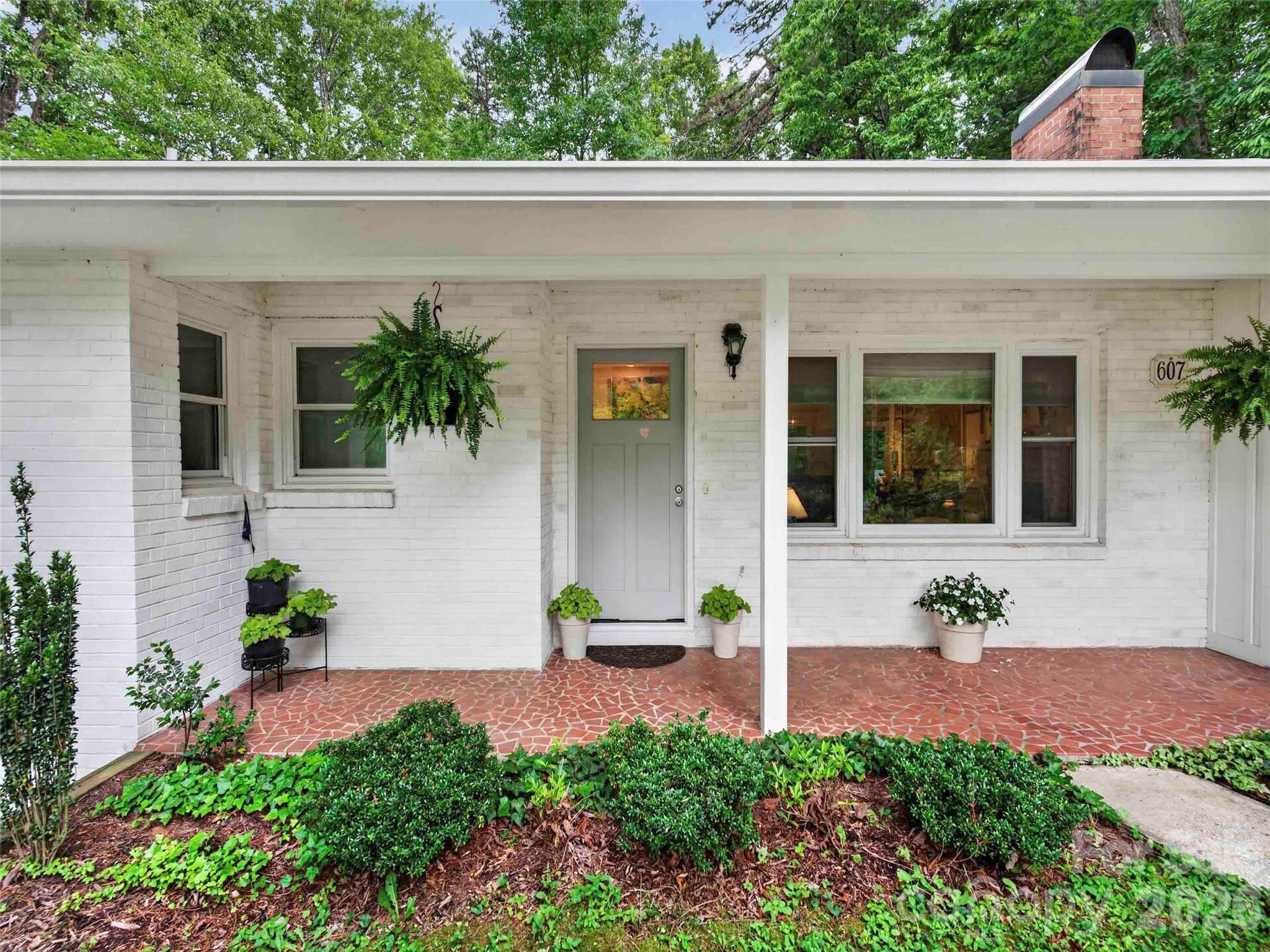 This completely renovated, move-in ready home is a special find and offers a long list of newly added features. A dream kitchen with high end appliances including Fisher & Paykel and Meile brands and a walk-in pantry will inspire the cook in you! The main level includes wood floors, a stone fireplace, two bedrooms and two newly renovated bathrooms. The lower level offers two new guest rooms, a beautiful full bath, a laundry room and an area currently used as a library/reading nook. A spacious workshop/storage room is also a plus there. You'll find peace of mind with the whole-house generator and attached garage. Enjoy being conveniently close to the charm of downtown Saluda with award-winning restaurants, museums, a public library and unique shops.