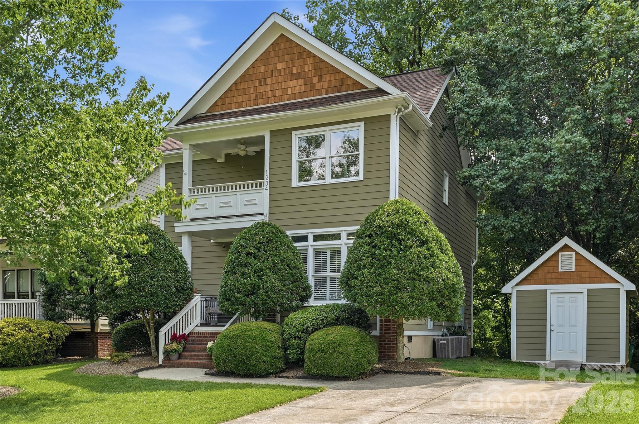 Nestled on one of Plaza Midwood's sweetest, quietest tree-lined streets, this beautifully updated 3 bed, 2.5 bath two story home offers the perfect blend of timeless charm and modern comfort just moments from the neighborhood's beloved restaurants, coffee shops, parks and boutiques. Step inside to a beautiful, neutral palette of NEW paint, a freshly remodeled kitchen with quartz counters, gas cooktop, stylish backsplash, quality cabinetry, and pantry. Gleaming hardwoods throughout main, striking marble gas fireplace in your living room and separate dining area overlooking your private, lush back yard. Front flex room perfect for home office, kids play area or to close off and make another separate room. Upstairs features your oversized primary suite with luxury bath, two nice-sized secondary bedrooms and full bath for a functional floor plan. Enjoy Carolina seasons on your upstairs front covered balcony which offers charming curb appeal. Out back is your private deck with pergola and a deep .25 acre lot. Separate storage shed convenient for outdoor storage. Incredibly maintained and cared for home with loving owners, ready to pass on to the next lucky homeowners.
