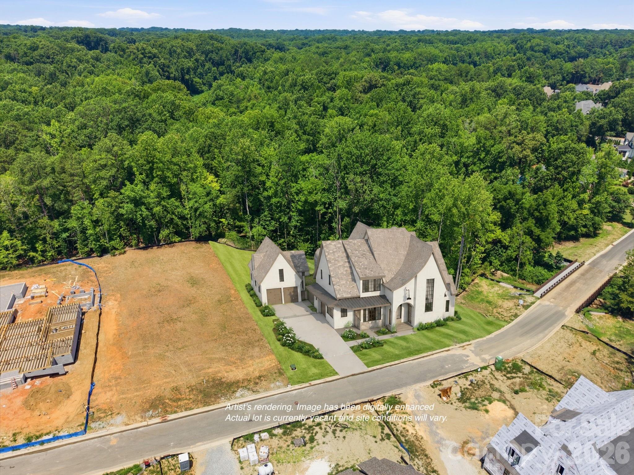 A custom home of this scale and architectural pedigree rarely comes to market before completion.

Designed by an award-winning Davidson-based architect and built by an award-winning local custom builder, this modern European Tudor will be among the most distinguished residences in Davidson. The main home offers 5,087 square feet of thoughtfully designed living space, complemented by an additional 917 square feet in the detached garage structure.

The main level is anchored by a primary suite with private sitting room — a true retreat within the home. The remainder of the main floor is equally considered: a scullery, pantry, laundry, flex office with full bath, and a covered porch with fireplace and retractable screen for seamless indoor-outdoor living. Upstairs features three ensuite bedrooms, a bonus room, second laundry, powder, and walk-in attic storage. The detached two-car garage offers a pool bath on the main level and a fully finished studio with full bath above — exceptional flexibility for guests or a private retreat. Pool-ready site.

Selections are still available. Two miles from the heart of downtown Davidson.