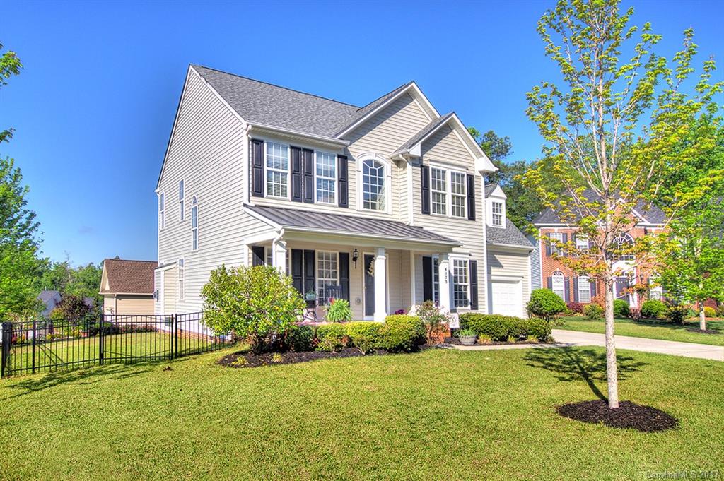Great home with flexible floor plan to accommodate your lifestyle. Rocking chair front porch welcomes friends & family. Freshly painted interior is bright & inviting. Office/study w/ french doors & formal DR.  Kitchen w/ gas range & ample 42" cabinet/counter space is open to GR.  Subway tile backsplash. Casual dining area & sunroom add to livability of this great home. 4 bdrms up (or 3 + bonus). New carpet in GR & sunroom. Easy access to shop/dine & 485. Easy walk to elementary school. Roof '14.