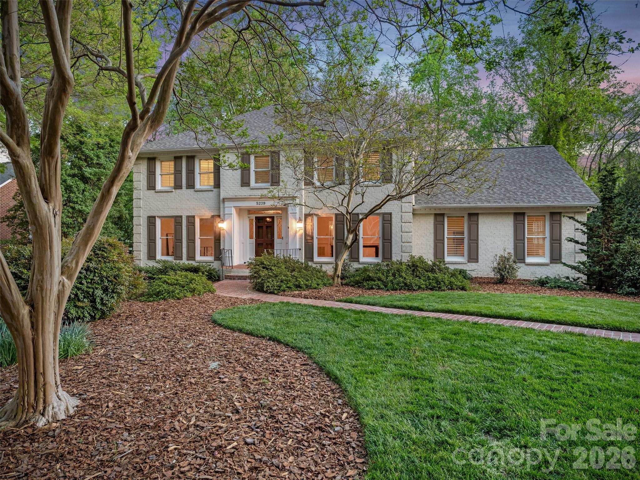 Nestled in the coveted Winding Brook enclave of SouthPark, this stately residence offers a masterfully designed floor plan tailored for both intimate family life and grand-scale entertaining. The heart of the home is a chef’s kitchen—outfitted with a premium suite of Wolf, Sub-Zero, Miele, Bosch, and Dacor appliances—centered around a prep island and sun-drenched breakfast area.

Transition effortlessly from the formal dining room to the expansive family room, or step outside to the screened porch and Trex deck to enjoy the lush, professionally landscaped grounds. Flexibility defines the main level, featuring a versatile bonus room and renovated full bath perfect for a main-floor primary or guest wing. Upstairs, the primary retreat serves as a private spa, boasting a soaking tub, glass-and-tile shower, and exquisite Rohl fixtures.  Three additional bedrooms and a renovated hall bath featuring Restoration Hardware fixtures complete the upper level.  The lower level adds incredible utility with a sixth bedroom/office, gym space, and a third living area. From the backyard’s charming gazebo and picturesque bridge to the brand-new roof and fresh updates throughout, this home defines luxury and convenience. Walking distance to grocern shopping, library; SouthPark Mall and to Foxcroft East walking trails and playground.  You're just steps away from a casual dinner at Brixx, dessert at Ben & Jerry's, or an awared-winning eveng at Barrington's.