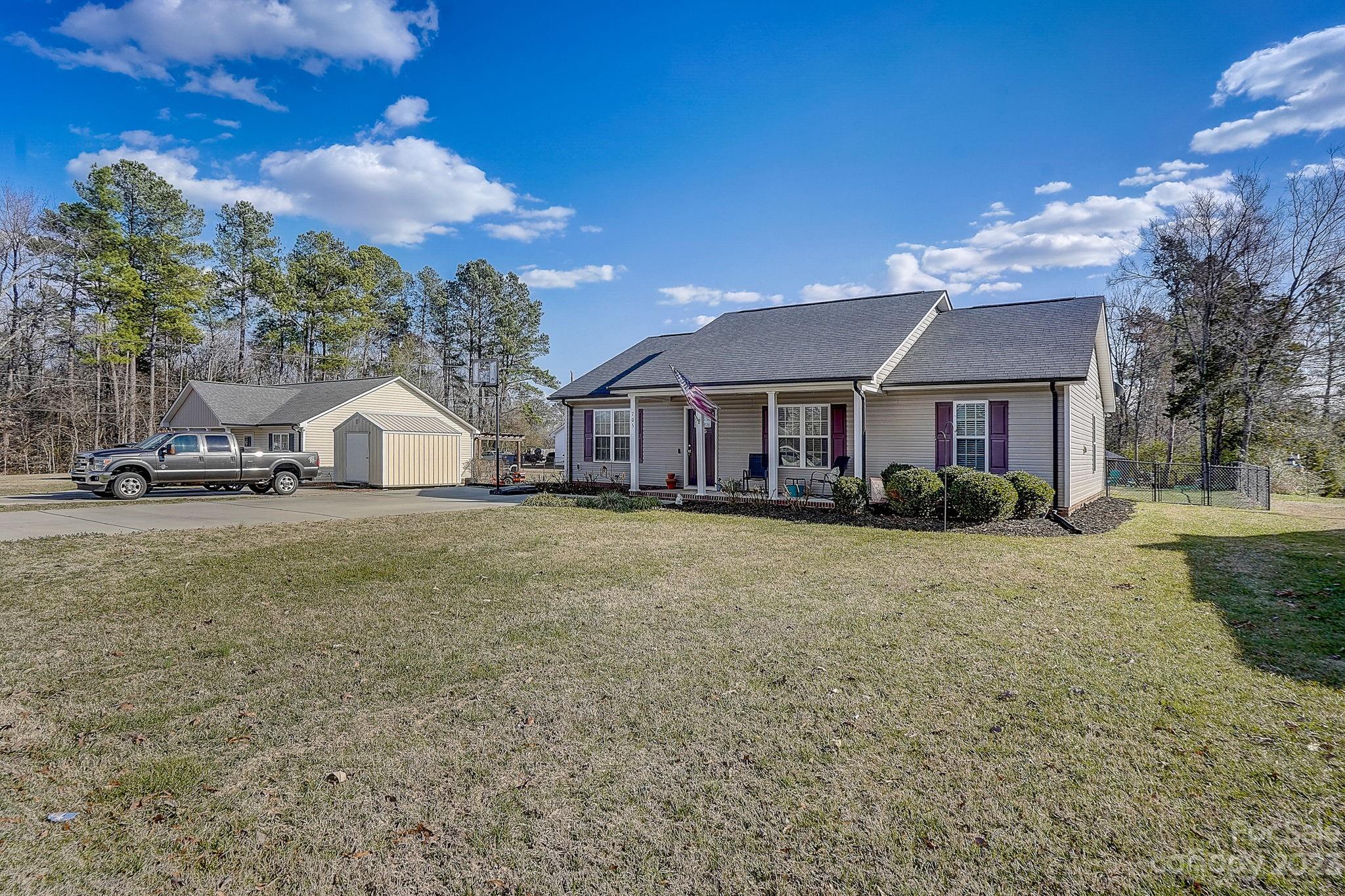 This home has everything you have been looking for....One owner home with lovely flat fenced in back yard. Move in condition, with neutral colors open floor plan. Bring your Toys home features a massive 24x30 shop that is wired 220. This home is a rare find. Very well maintained and cared for. Nice landscaping in front and back. You wont want to miss this opportunity to have a 1 level home and a shop all in one deal! Professional pictures uploaded by 02/03/2024