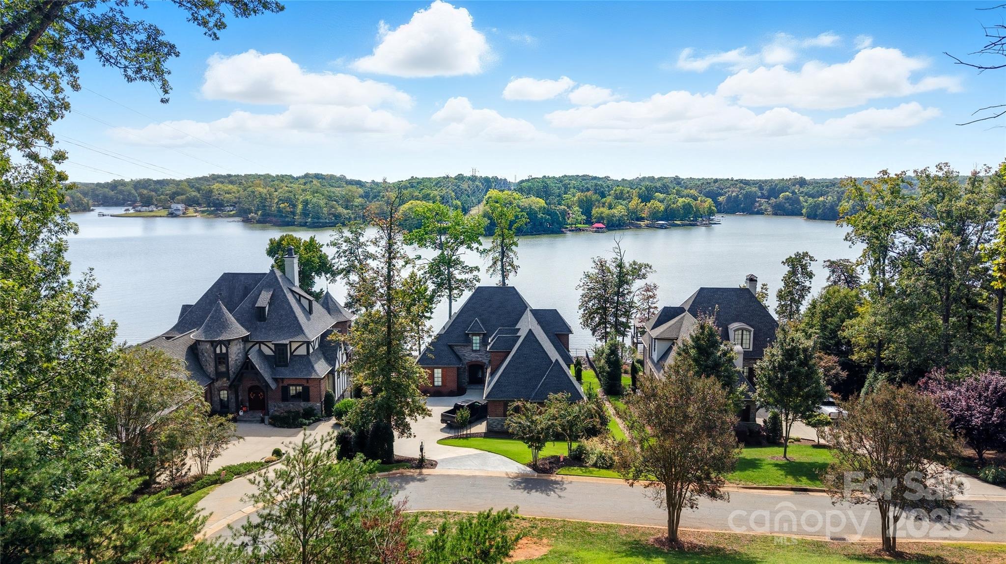 Discover the PERFECT CANVAS for your Custom-Built Dream Home on this .86-acre wooded lot offering Spectacular views of Lake Wylie! Ideally suited for basement construction, this gently sloping lot is perfectly positioned at the end of a private, no-outlet cul-de-sac, providing added privacy and limited through put traffic.
Located in the gated community of Reflection Pointe, residents enjoy resort-style amenities including a clubhouse, lagoon-style pool, lighted tennis and pickleball courts, putting green, playground, paddle boating, picnic areas, walking trails, and a marina with private beach access. Boat and RV storage available (contact HOA for details).
Enjoy the perfect balance of luxury, privacy, and lakeside living just 10 minutes from downtown Belmont, 20 minutes to Charlotte Douglas Airport, & 30 minutes to Uptown Charlotte! Schedule your private tour today! Build Today or Invest in your Future!
The builder and home-style must meet the requirements of the community's architectural guidelines.