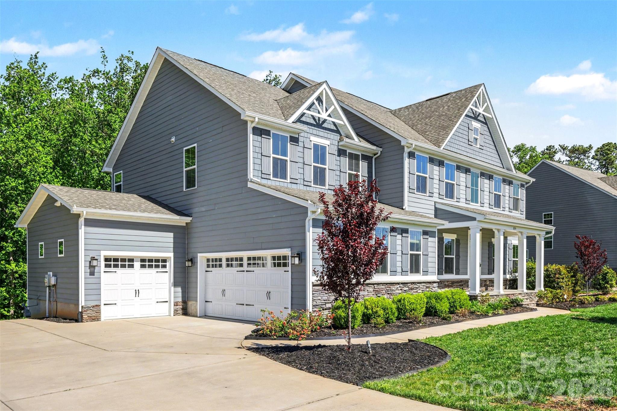 Welcome to Brookmeade in Waxhaw where you will find a competitively priced and appealing property in a community that blends the tranquility of nature with the convenience of nearby amenities! Whether you like to entertain indoors or outdoors, this home offers spaces on each level for intimate settings or large gatherings. The main level highlights a large kitchen with a five-burner gas cook top and separate double-ovens. An expansive granite-topped island allows company to perch during meal prep or just chat over coffee. The great room and exterior-covered porch adjacent to the kitchen offers easy access to the deck and rear yard. Do you prefer an office or library for the enclosed room across from the dining area? A fireplace located in the great room could accommodate a flat screen TV or art: you choose. Transition your overnight guests to the lower-level living space with a separate bedroom and full bath complemented by an additional living area and a media room. Private enough with walkout to patio, fire pit, and spacious rear yard. The upper level also features an opportunity for creative use: imagine a game room, study area, workout space, or quiet nook to relax. Wind down by retreating to the upper-level Owner Suite with tray ceiling, two separate walk-in closets and in-suite bathroom. Plus, four additional bedrooms, two full baths and laundry room add to your choices. Additional features include a tankless water heater, water filtration system, and three-car garage. When you are ready to venture outside your neighborhood, enjoy the locally owned shops, horseback riding, farm tours, or exploring the surrounding towns. This home is "the one!" Tours are available by appointment.