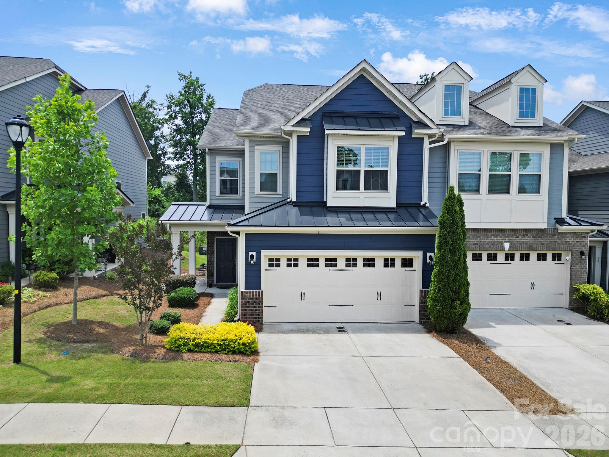 Welcome to luxury living in the highly sought-after Cameron Creek community in Tega Cay! This stunning end-unit townhome offers the perfect blend of upscale finishes, an unbeatable location, and resort-style amenities including a Olympic size pool.

Step inside to discover a light and bright, open-concept floor plan featuring Luxury Vinyl Plank flooring throughout the main level, elegant wood tread stairs, recessed lighting added (kitchen, living & primary bedroom) and a cozy fireplace anchoring the spacious living room. The chef’s kitchen is designed to impress with granite countertops, subway tile backsplash, stainless steel appliances, and a gas range—perfect for entertaining or everyday living.

Retreat to the oversized primary suite complete with a spa-inspired bath featuring dual quartz vanities, a soaking tub, separate tile shower, and a large walk-in closet. Upstairs also offers two additional spacious bedrooms and a hall bath with dual sinks. This home features a SmartHub which controls lights (Zwave switch), thermostats, doorbell camera and security system (service contract required).  Over $17,000 in upgrades!

Enjoy all that Cameron Creek has to offer including a large community pool with kids’ splash zone pool, playground, outdoor fireplace, and neighborhood activities that create a true sense of community.

The location is simply unmatched—walk to ice cream shops, restaurants, shopping, and local breweries while enjoying award-winning schools and low South Carolina taxes. The property is currently taxed at the investor rate of 6%; if you make this property your primary residence in South Carolina then the tax rate is 4% which is approximately 1/3 of the current annual tax amount.

Consistently ranked among the Top 3 Places to Live in South Carolina, Tega Cay offers an incredible lifestyle with convenience, charm, and community all in one.