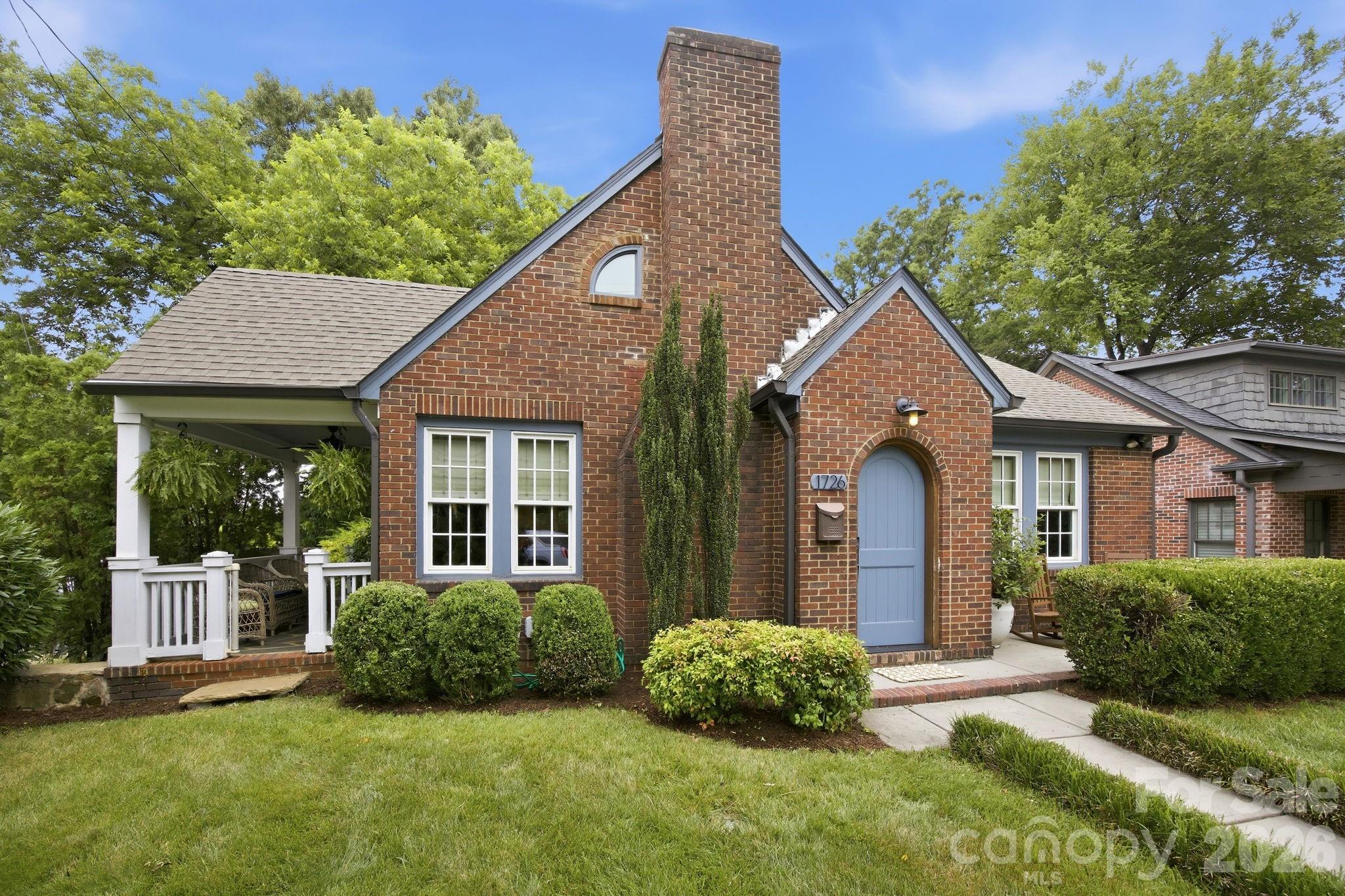Rare opportunity to own this impeccable all-brick home in the heart of Wilmore, just steps from South End's restaurants, breweries, shops, parks, and light rail.  Located on the prime corner of Mint Street and West Boulevard, this beautiful 3 bedroom, 2 full bath residence offers exceptional curb appeal and convenient access to ample parking on your own property accessible from both streets.  The main level features a living room with fireplace, a charming dining room with built-in cabinetry, and a stunning kitchen highlighted by an impressive 48" Viking range, custom tile work, marble counters, and designer finishes. Also on the first floor are two spacious bedrooms, a full bath, and a versatile office/laundry room that perfectly blends function and style. Rich hardwood floors run throughout the home, while 9-foot ceilings create an open and inviting atmosphere.  Upstairs, the private primary suite offers tons of space and privacy.  At 570 square feet, this luxurious space includes a large walk-in closet and a beautifully appointed bath featuring dual vanities, a custom marble walk-in shower, and a freestanding soaking tub.  The basement, currently used as a workout and storage area provides ideal flex space and offers many possibilities for future owners.  Outside, the generously sized backyard has charming gathering spaces and mature landscaping creating a tranquil setting for relaxing or entertaining. Exceptional privacy, and plentiful parking further enhance the property's appeal.  Perhaps best of all, this home places you within walking distance of everything that makes South End one of Charlotte's most vibrant destinations; Bank of America stadium, restaurants, breweries, shops, parks, the light rail, and miles of walking and jogging trails are all within walking distance.  Enjoy the energy and excitement of city living while returning home to your own peaceful retreat.