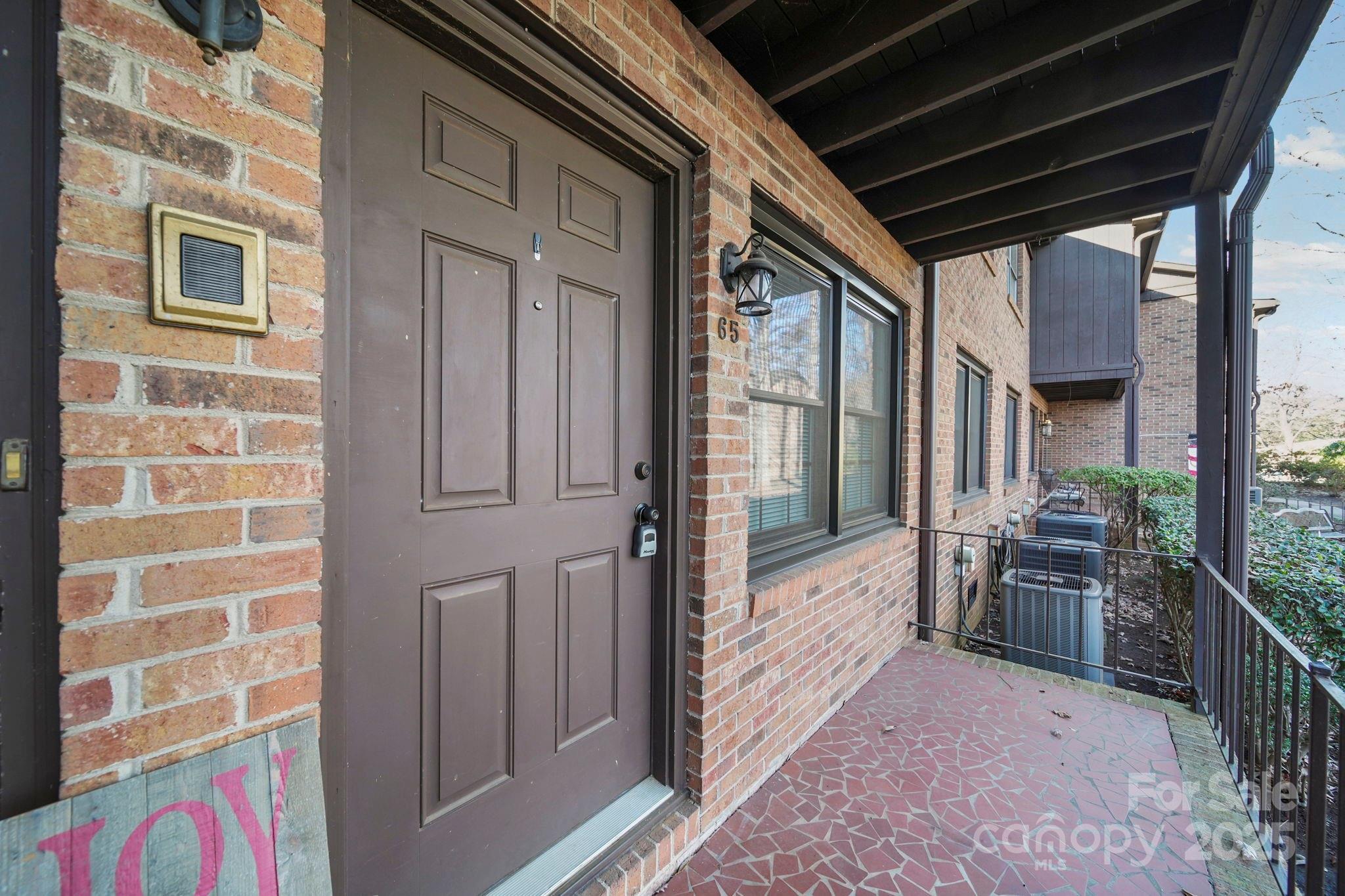 Welcome to this charming 2-bedroom, 2-bath condo in the desirable Sherwood neighborhood of Gastonia. This well-maintained home offers a comfortable, functional open floor plan featuring a bright kitchen—including the washer and dryer—a spacious dining area, and an inviting den ideal for entertaining or everyday living.

The primary suite includes an ensuite bath with vanity and dressing area, along with private access to the rear balcony—an ideal spot to unwind. Recent updates include fresh paint tones, luxury vinyl plank flooring, and modern lighting throughout.

Assigned front parking plus a one-car rear carport adds everyday convenience. Conveniently located just off Garrison Blvd, close to creeks, greenways, parks, and downtown Gastonia’s shopping and dining. Move-in ready and well-suited for low-maintenance living.