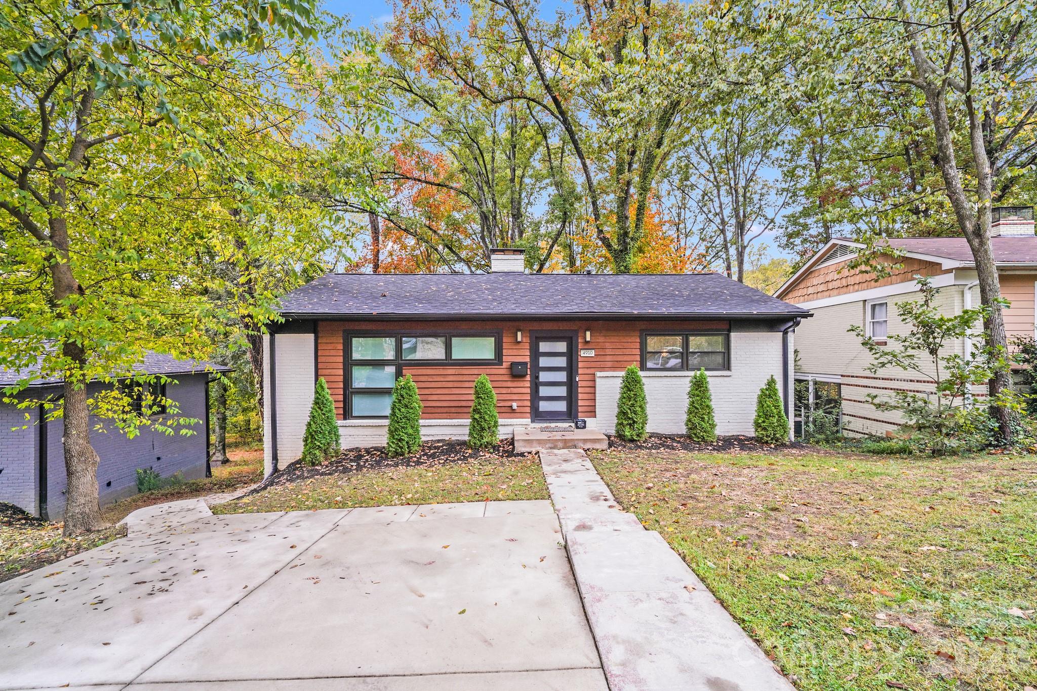 This move-in ready, fully remodeled brick home offers the perfect blend of location, style, and functionality—just minutes to Park Road Shopping Center, SouthPark Mall, South End, and Uptown Charlotte, and only 15 minutes to Charlotte Douglas International Airport—making this a true commuter’s dream.

Inside, you’ll find a spacious, open-concept floor plan designed for modern living, featuring brand-new flooring, new energy-efficient windows, and abundant natural light throughout. The designer kitchen with updated finishes is ideal for entertaining and flows seamlessly into the main living areas.

The lower level offers versatile flex space perfect for a home office, media room, or guest retreat, complete with a wine fridge and expansive windows overlooking your private, tree-lined backyard. The primary suite is a true retreat, featuring a spa-inspired ensuite bath and a large walk-in closet, with laundry conveniently located nearby for everyday ease.

Step outside and enjoy exceptional outdoor living spaces, including a screened-in porch, covered deck, and pergola, all overlooking a private natural oasis—ideal for relaxing or entertaining year-round.

Located in one of Charlotte’s most desirable areas, this home offers easy access to top dining, shopping, and major commuter routes, making it a fantastic option for a primary residence or investment opportunity in the Charlotte market.

Schedule your private showing today and experience why this Selwyn Park gem is truly a hidden find!