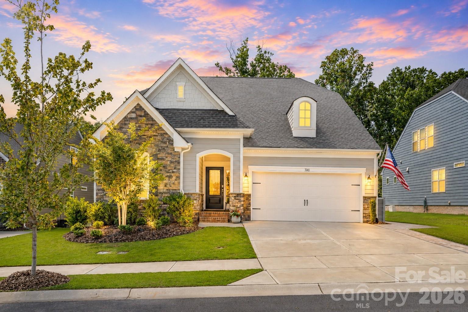 Beautifully maintained and thoughtfully upgraded home in sought-after Millbridge! Two generous secondary bedrooms are positioned at the front of the home just off the foyer and share access to a full hall bath, offering comfort and privacy for family or guests. Just down the hall, the formal dining room showcases elegant wainscoting and a statement chandelier, creating the perfect setting for entertaining.

The open-concept living space at the rear of the home is designed for both everyday living and gathering. The gourmet kitchen features double ovens, a gas range, a large center island with seating, and a sunny breakfast nook overlooking the backyard. The kitchen flows seamlessly into the spacious living room, where a gas log fireplace and an expansive wall of windows fill the home with natural light.

The luxurious main-level primary suite offers a private retreat featuring a formal sitting area with direct access to the back patio, and a luxurious ensuite bath complete with a dual sink vanity and a glass-enclosed shower. Upstairs, a spacious loft provides the ideal flex space for lounging, media, or entertaining, along with an additional bedroom and full bath perfect for overnight guests.

This home is filled with thoughtful upgrades, including a whole-house air purification system, custom shutters and shades, and beautifully maintained finishes throughout. Outdoor living shines with a covered screened porch and an expansive custom paver patio with retaining wall and fully fenced backyard, all surrounded by lush mature shade trees for added beauty and privacy.

Residents of Millbridge enjoy exceptional community amenities including a clubhouse, fitness center, outdoor pool, sport courts, and more!